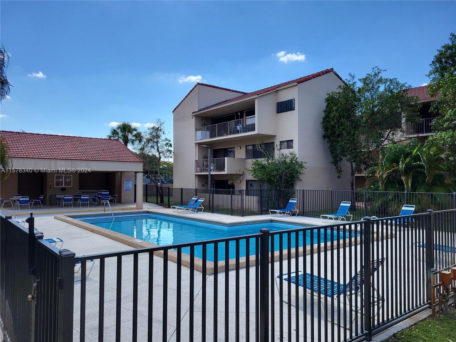 Rare Opportunity to own your dream residence in Miami Lakes! Spacious Corner Unit, Third Floor Condo with Two Bedrooms and Two Full Bathrooms. Open Layout with Split Floorplan. Primary Bedroom has its own Balcony and Dual Sinks in Master Bathroom. Walk-In Closet. Laundry Room. Hurricane Accordion Shutters. Open Concept Kitchen includes Dishwasher, Range, Refrigerator, Disposal and Mini-Bar. Cabinetry has recessed lighting. Crown Molding throughout. Large Balcony measures 25' X 6' (150 SQFT). Central A/C. Added Perk is the High-Ceiling Attic with Plenty of Space for Storage. Amenities include a Pool, Private Parking and Elevator. Close to Local Restaurants, Parks and Main Highways. Very Safe Neighborhood perfect for raising a family or a quiet serene-style living. Showings by SUPRA