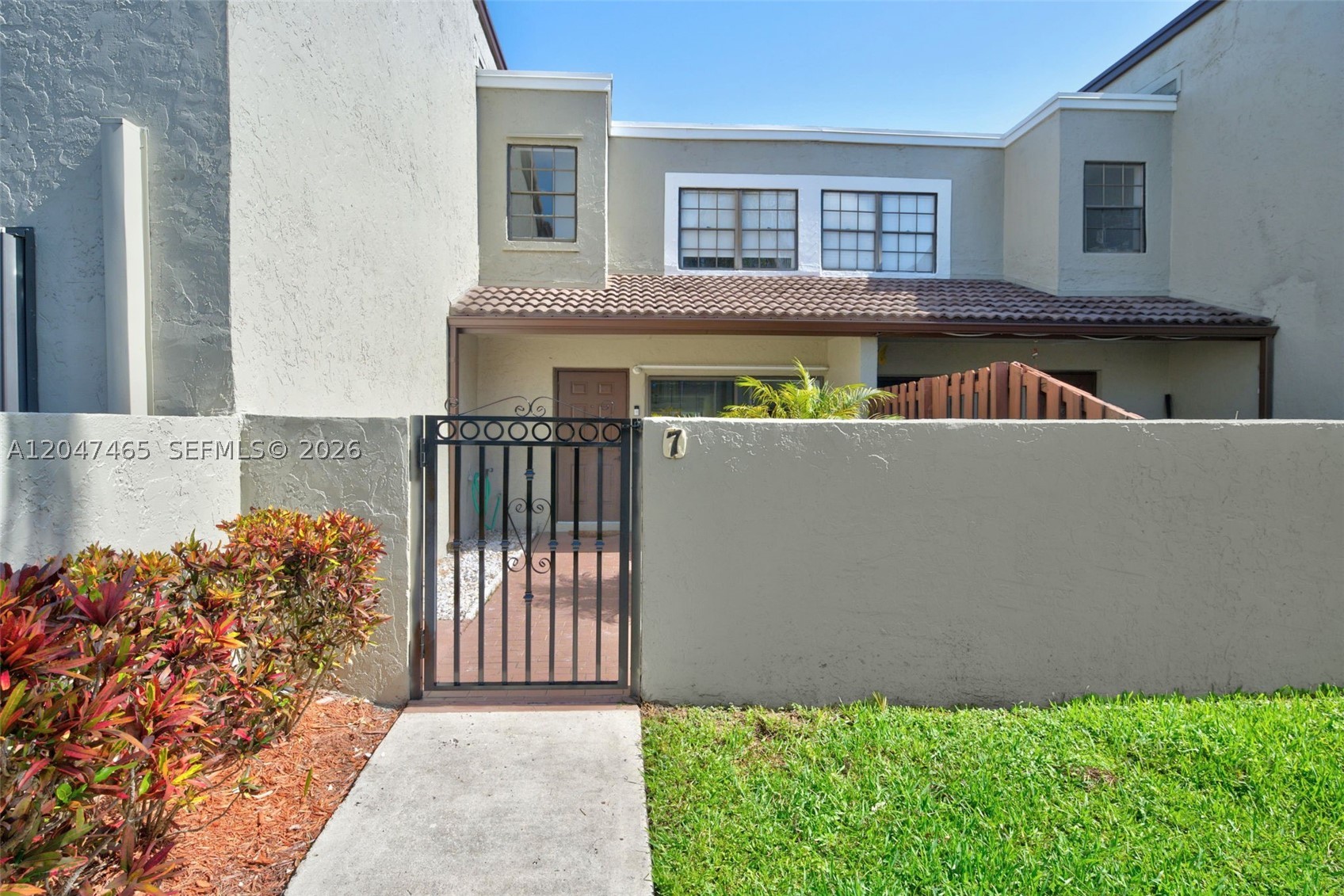Welcome to this beautifully updated townhouse in the sought-after Hammocks community, where comfort, style, and convenience come together. Filled with natural light, the inviting interior features a renovated kitchen and updated bathrooms with modern finishes, creating a move-in-ready living space. The open patio and fully fenced backyard offer a private setting for outdoor dining, entertaining, or simply relaxing. The functional floor plan is designed for everyday living while providing a warm and welcoming atmosphere. Enjoy the scenic lakeside walking and jogging paths just moments from your door, along with the benefits of a pet-friendly community featuring ample guest parking and one assigned parking space. Ideally located near top-rated schools, grocery stores, hospitals, shopping, dining, and the Florida Turnpike, this home offers exceptional convenience with easy access to everything Miami has to offer.