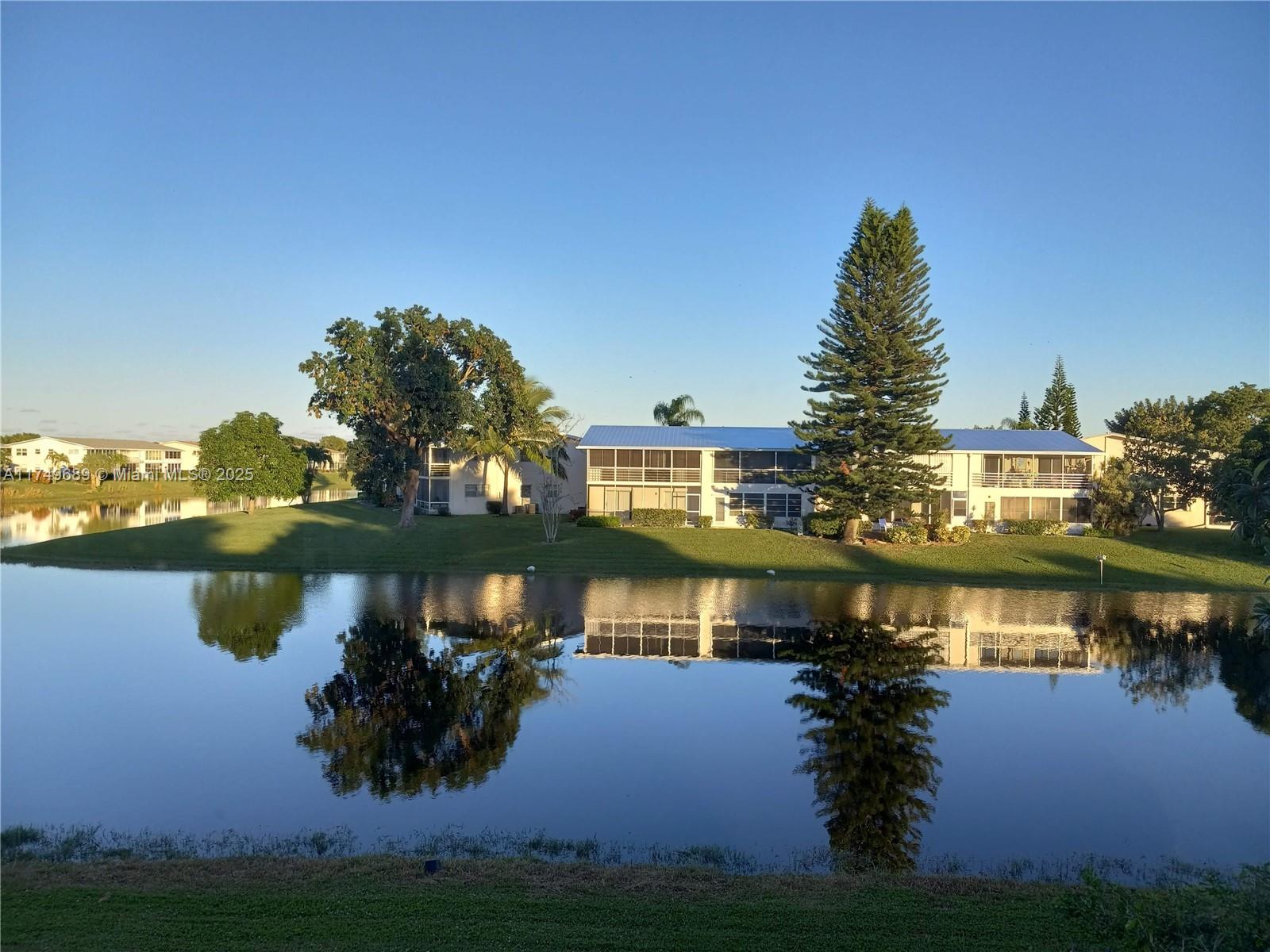 Directly on the water, Experience a stunning water view from this fully furnished turnkey second-floor unit with an enclosed patio. The building is in excellent condition. Century Village provides all the desired amenities and more. No road noise whatsoever from this stunning unit, enjoy the tranquil patio and all that Century village has to offer. This unit looks even better in person, bring your fussiest buyer. Lake view will not dissapoint.