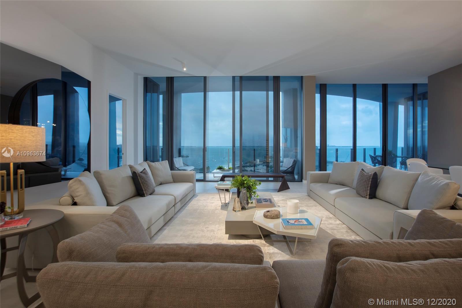 This one of a kind condo in One Park grove tower has spectacular views and has an exquisitely designed interior, with 2 units combined to create over 5100 sqft of living space, with 5 bedrooms 5 and a half baths. The living area is split with a beautiful glass wine room, a open kitchen design ideal for entertaining. Park Grove offers the ultimate lifestyle in Miami, Walk to the center of the grove with numerus restaurants, cafes and boutiques or enjoy the endless amenity options in Park Grove. Which include a top of the line spa, 2 gyms, movie theater, kids playroom, 3 swimming pools, expansive gardens, amphitheater, Michael Swartz's Tigertail and Mary restaurant, stunning meeting rooms with kitchen for parties, concierge services and more.