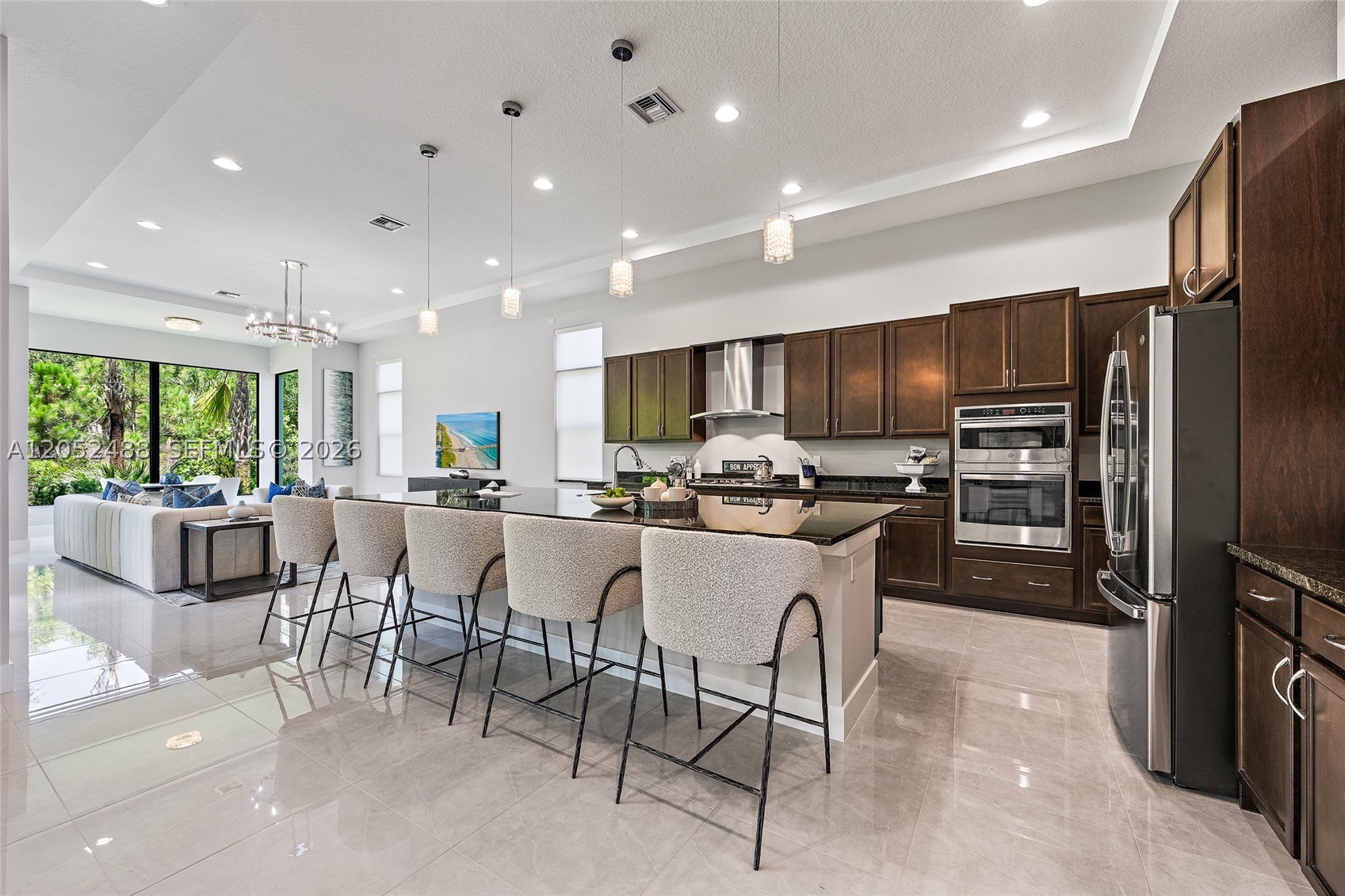 PRICED TO SELL! Never lived in, this brand-new construction home presents an incredible opportunity to own one of the largest floor plans in the gated community of Artistry. Designed with today's lifestyle in mind, the spacious open layout is highlighted by soaring ceilings, expansive living areas, and a seamless flow that is ideal for both everyday living and entertaining. This thoughtfully designed residence offers generous room sizes, abundant natural light, and the peace of mind that comes with owning a brand-new home. Whether you're hosting family and friends or simply enjoying the spacious interior, this home delivers the comfort, style, and flexibility today's buyers are looking for.
