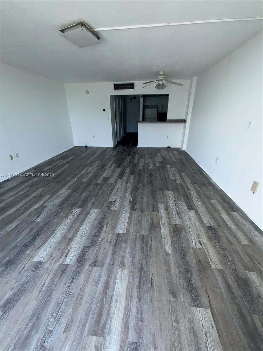 GOOD FOR INVESTORS OR TO LIVE IN Spacious and bright studio residence at Three Horizons North featuring laminate flooring throughout, freshly painted interiors, and open unobstructed views with no blocking buildings. Well-maintained layout offering comfortable living in a centrally located community. Prime location in the heart of the city with convenient access to major highways, shopping, dining, and entertainment. Just 10 minutes to Aventura, 15 minutes to the beach, and 15 minutes to Brickell. Ideal for anyone seeking convenience, accessibility, and great city living.