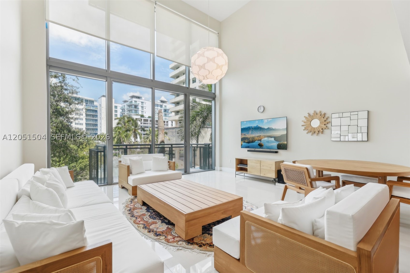 We are excited to introduce a remarkable property at Terra Beachside - a stunning furnished two-bedroom, two bathroom unit with a loft. Boasting 1700 SF of living space & 182 SF of balconies, this residence offers unparalleled privacy and canal views, making it a rare find in the complex and area. The unit features impressive 19-foot ceilings and floor-to-ceiling high impact windows that flood the space with natural light, creating an inviting and spacious ambiance. Residents of Terra Beachside have access to a host of amenities, including a swimming pool, gym, and recreation room, ensuring a lifestyle of comfort and convenience. Situated just steps away from the beach, and in close proximity to an array of shops, cafes, and restaurants, the location of this property is truly unbeatable.