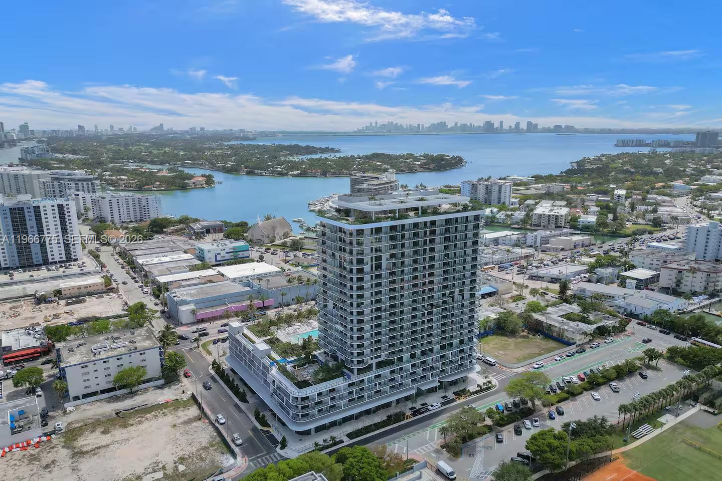 Rare opportunity to own in 72 Park, Miami Beach’s newest luxury development, ideally located in the highly sought-after North Beach neighborhood just two blocks from the ocean. This short-term rental–friendly building offers exceptional flexibility, making it ideal as a primary residence, second home, or high-performing income property. This stunning open one-bedroom residence features breathtaking panoramic views of the Atlantic Ocean, Intracoastal Waterways, and the Miami skyline. Designed with modern elegance, the unit offers a bright open layout, floor-to-ceiling glass, and seamless indoor-outdoor living.