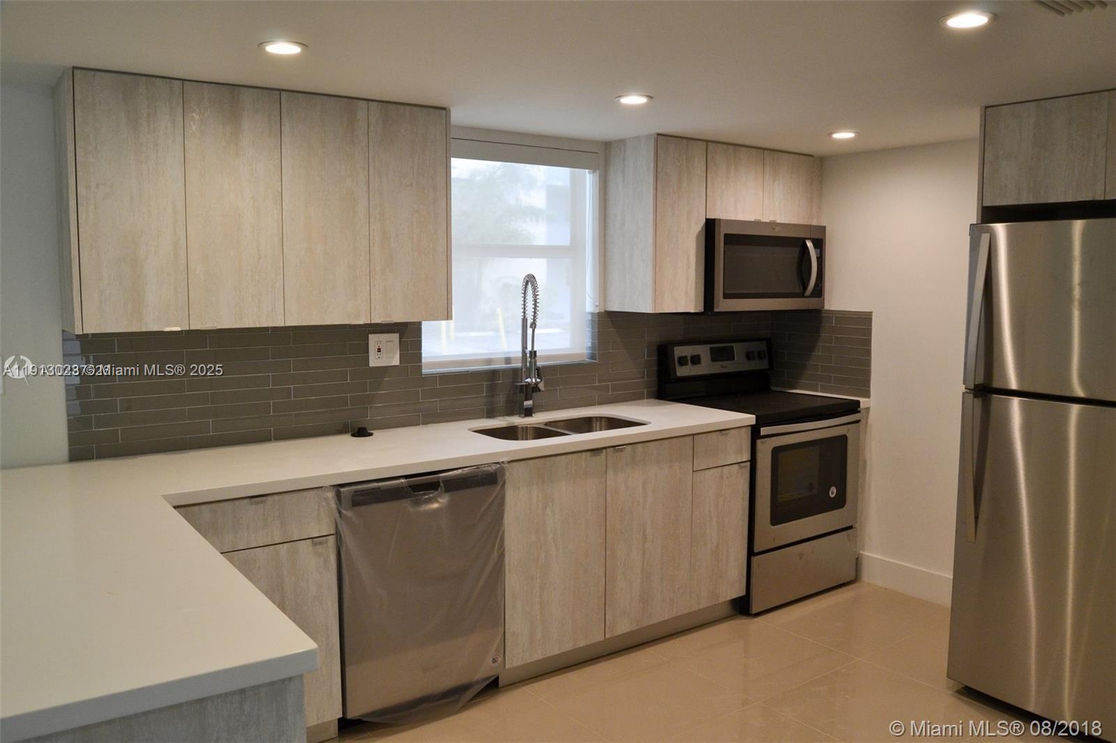 Beautifully remodeled and modern 1-bedroom, 1.5-bath condo in the highly desirable Beach Club at Fontainebleau Park! This vacant unit offers a sleek open layout, updated kitchen and baths, in-unit laundry, and a private balcony overlooking lush greenery. Enjoy resort-style amenities: pool, gym, tennis courts, playground, and lakefront trails. Prime central Miami location—just minutes from Dolphin Mall, Miami International Mall, the airport, and major highways (826, 836 & Turnpike). No rental restrictions, 1-year minimum lease. Ideal for end-users or investors seeking convenience, style, and lifestyle in a vibrant, well-kept community.