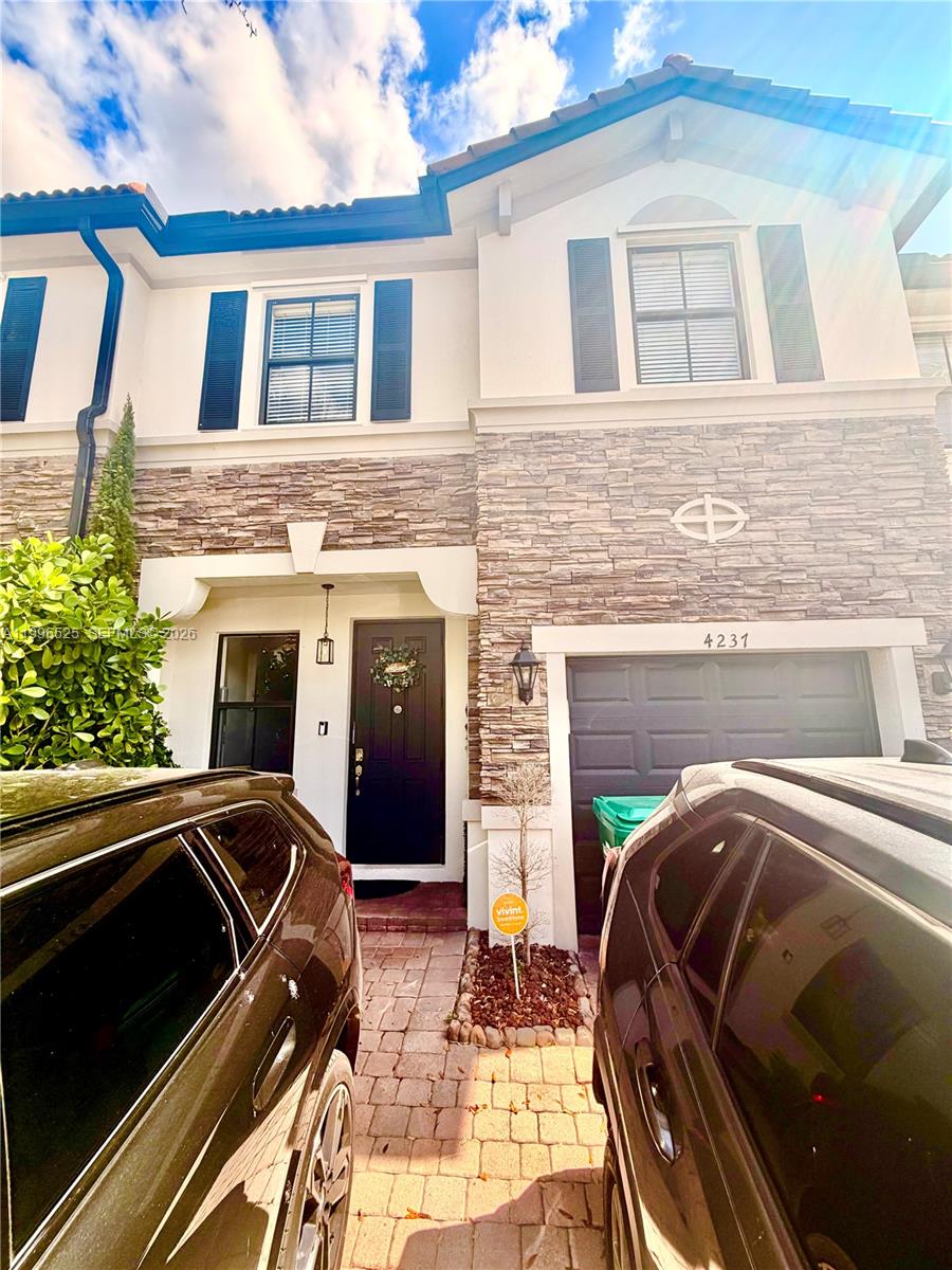 beautifully renovated 2-story townhouse located in Interlaken Community. Completely renovated, kitchen with spacious island and quartz counter with new and modern Samsung brand appliances, touch screen refrigerator with access YouTube, Spotty, etc. The first-floor tile is 32x32 marble, the second-floor tile is waterproof. Spacious living room that allows the view from the entrance to the end of the patio that overlooks a beautiful lake. Beautiful and large patio. 1/2 bathroom and garage renovated. Large master room with walking closet and bathroom, comfortable laundry with new washer & dryer Samsung, 2 rooms more spacious and bathroom. 2 parking spaces, 1 garage and guest parking, low fee maintenance.