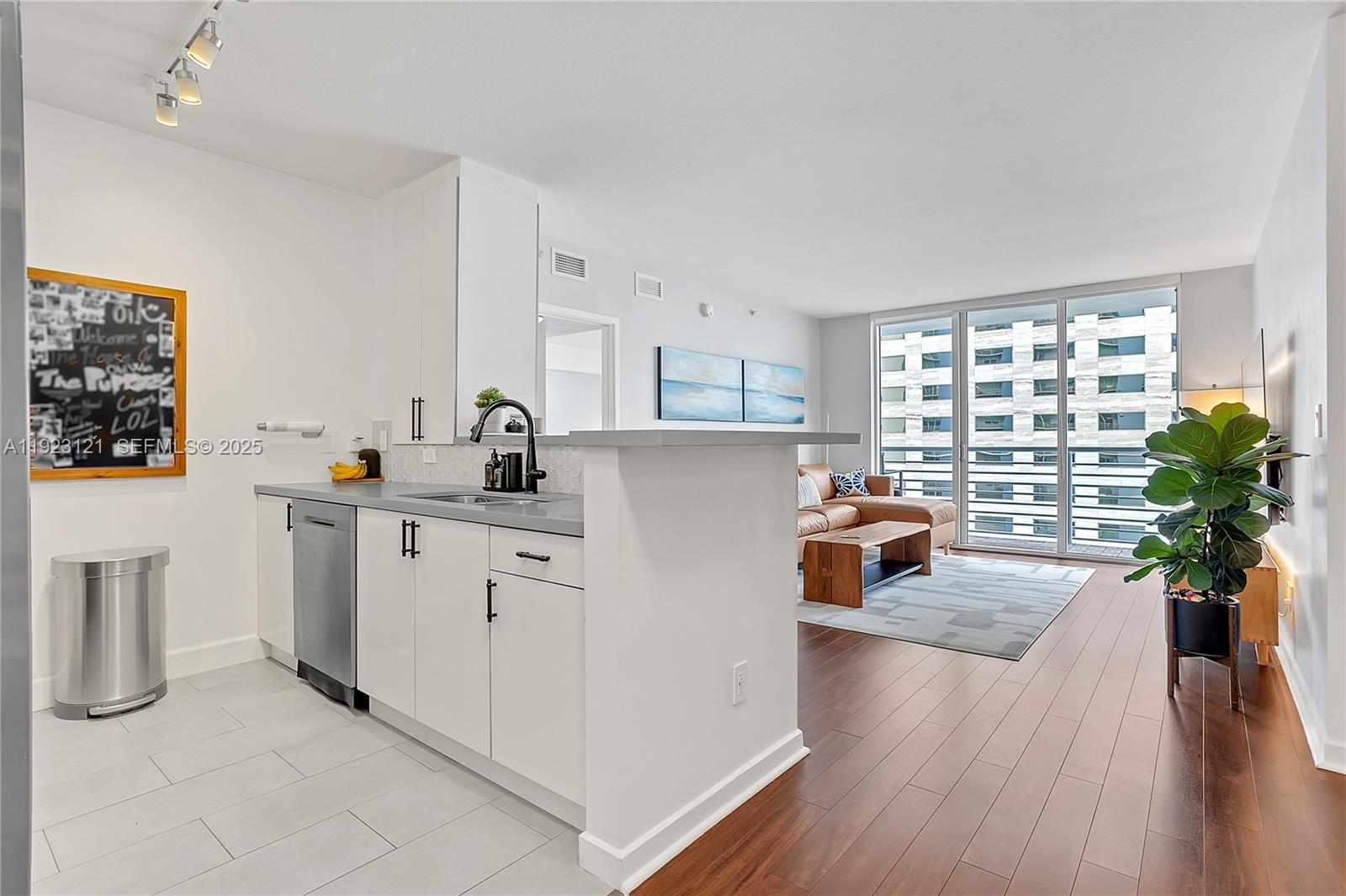 Live in the heart of Downtown Miami at this stunning 2-bed, 2-bath corner-unit condo with 1,169 sq ft of bright, open living space. Floor-to-ceiling windows flood the home with natural light and frame breathtaking direct views of Biscayne Bay and the Miami skyline from both the living room and private balcony.
Modern finishes, renovated kitchen, wood floors and in-unit washer & dryer, along with one assigned covered parking space included. Enjoy resort-style amenities: two gyms, party room, bayfront pool, 24-hr security & concierge. Cable and high-speed internet included in rent.
Move-in ready with fast and easy approval process. Schedule your tour today!