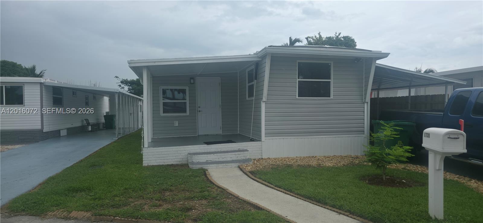 Very prestigious Park City Neighborhood, Enjoy it this just remodeled udpdated single mobile home with 3 bedrooms and spacious livingroom area. New air conditioner very cold fresh in the whole house a lot of air conditioner outlets. new kitchen and counters. Screened Porch, Laminate Flooring. A lot of windows in single room that offer natural Light Enough. Huge patio on the back arounding the house with the canal in the back. The community offers pools, golf course and lake! Laundry. Dryer and Washer. Parking 2 Attached Carport Spaces. Security Resident Manager or Management On Site. Pet Policy Breed Restrictions. 
Peaceful  55+ senior community with a social schedule with something for everyone.