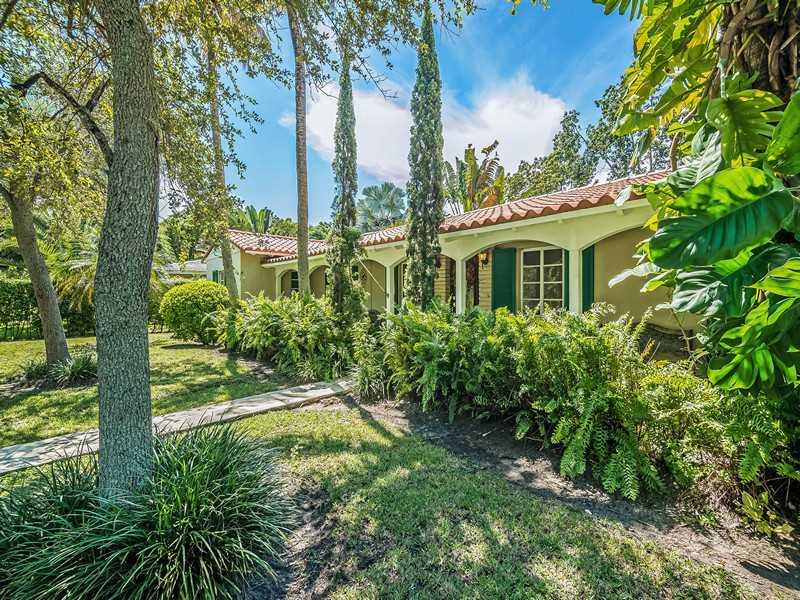 Sublime 1 level duplex on uber sought-after Segovia Street right across from the Coral Gables Library's Butterfly Garden and walking distance to the Venetian Pool, Youth Center and a bike ride to Miracle Mile, schools and shoppes. The location cannot be a ny better. Offering  2 bedrooms and 1 bath on each side and both enjoy cathedral ceilings, tile flooring and both share a wide, covered front porch. The possibilities abound in the 12,500 sf lot for future development. This is truly an investor's dream!