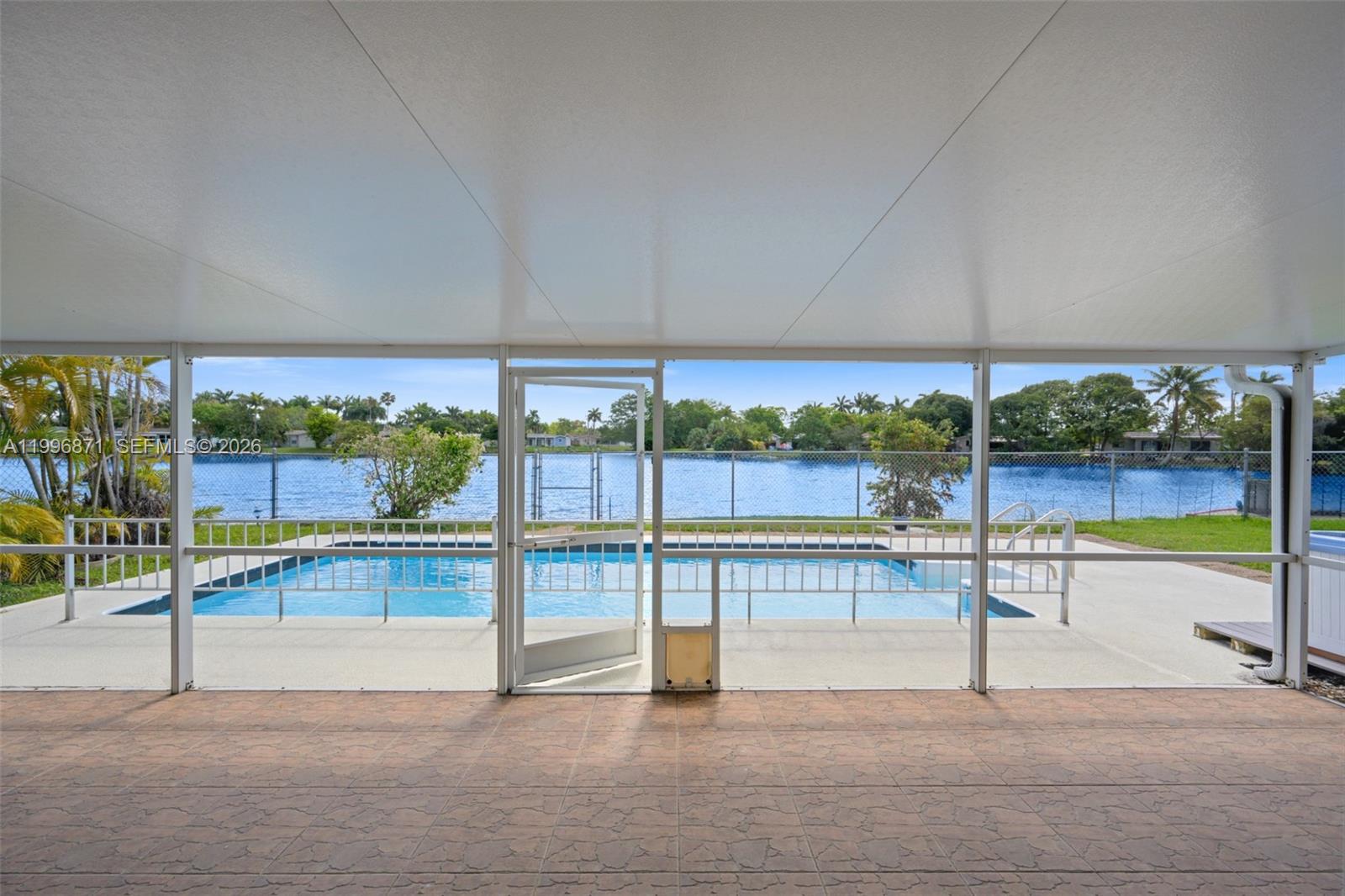 STUNNING WATERFRONT LIVING. MOTIVATED SELLER GIVING 10k SELLER CONTRIBUTION FOR CLOSING COSTS AT FULL PRICE.
This beautifully maintained 2-bedroom, 2-bath pool home sits on a wide canal, offering peaceful views and a true connection with nature. Spacious Florida room provides additional living space with direct views of the water. The gourmet kitchen has been thoughtfully updated with quartz countertops, custom backsplash, stainless steel appliances, a gas stove, and ample cabinetry.
Enjoy your private backyard oasis featuring a covered and screened patio, an open pool area, and a fully fenced yard—ideal for both relaxation and entertaining! 

Travertine flooring throughout
Hurricane impact windows and doors
Air-conditioned 1-car garage with hurricane-rated door
Generator included for added peace of mind 
Recent updates include roof (2019) and A/C (2020).

Centrally located near shopping, dining, and major conveniences. Perfect for your family!