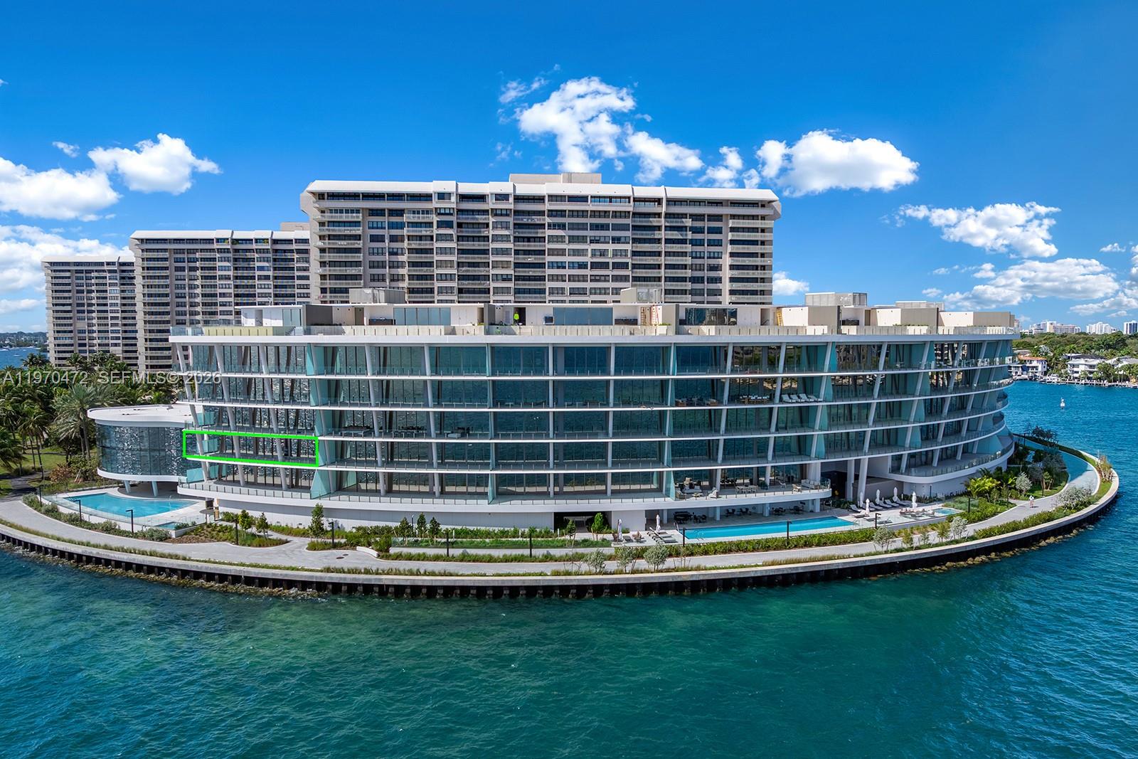 An exceptional waterfront residence at Vita at Grove Isle, by renowned developer Ugo Colombo, is located on a private island accessed through a security-staffed gatehouse and offers 1,119 SF of expansive terraces with unobstructed views of Biscayne Bay. The residence features a private elevator foyer entry, 10' FT ceilings, and Italian marble flooring throughout. The chef’s kitchen includes an oversized island, Miele appliances, and Molteni&C cabinetry with a built-in wine cooler. The primary suite opens to the bayfront terrace and features spa-inspired bathrooms with Italian stonework, a glass-enclosed steam shower with rainfall showerhead, dual vanities, and a spacious walk-in closet. All secondary bedrooms are ensuite with walk-in closets and terrace access. Smart home technology includes a Crestron system and Lutron HomeWorks lighting. Residents receive membership to the prestigious Grove Isle Racquet & Yacht Club, along with 24/7 valet and concierge services, two pools, a fitness center and spa, tennis, padel and pickleball courts, restaurant, private clubhouse, and more. The residence includes two valet parking spaces, with a private garage available for purchase.