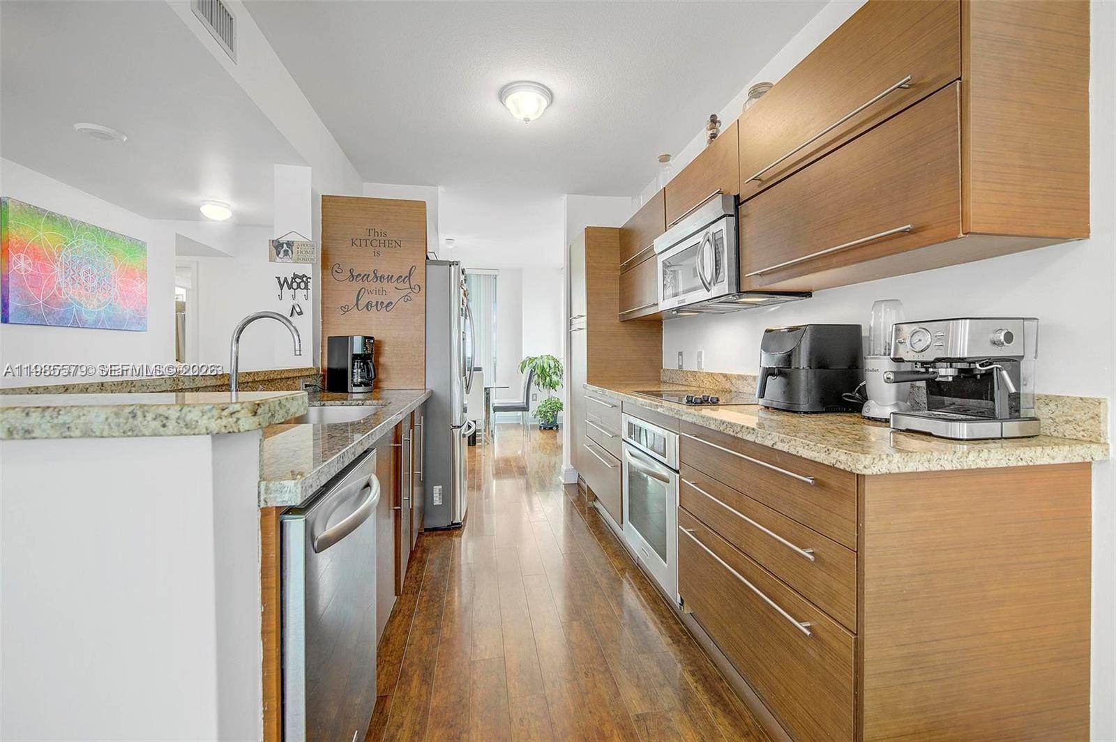 TAO SAWGRASS CONDOMINIUM - Residential