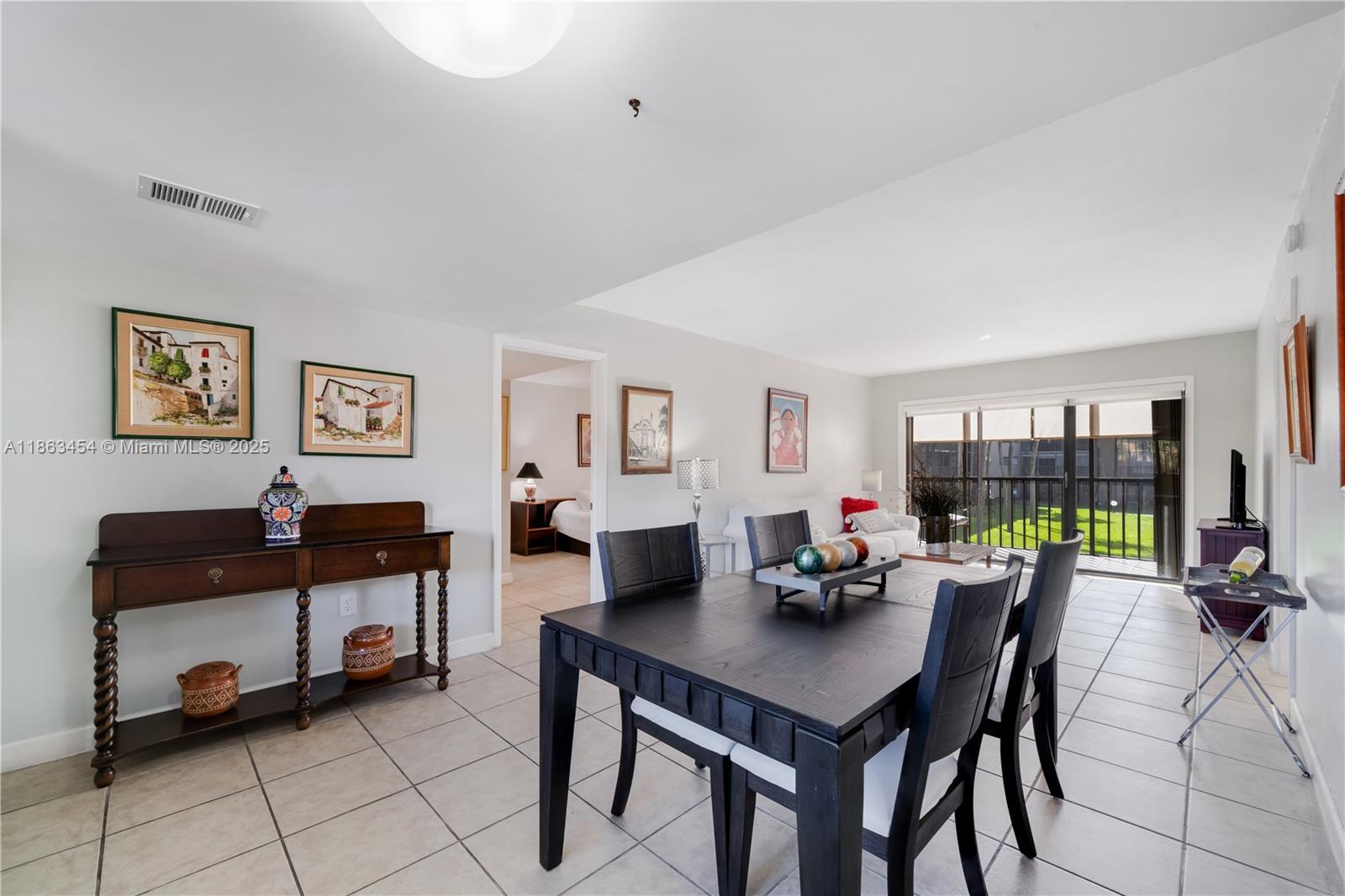OWNER IS PAYING FULL ASSESSMENT IF THERE IS ONE. Beautiful condo unit in the desirable community of  Kendall Acres West.   Split floor plan with two large bedrooms and baths with walk in closets.  Large screened in balcony overlooking the beautiful garden.  In unit full size washer and dryer inside.  Accordion hurricane shutters.  Community offers two pools, gym, four tennis courts, a clubhouse w/billiard tables and sauna.   Great location within walking distance to supermarket, restaurants, near highways, Miami Dade Community College Kendall campus, and much more.