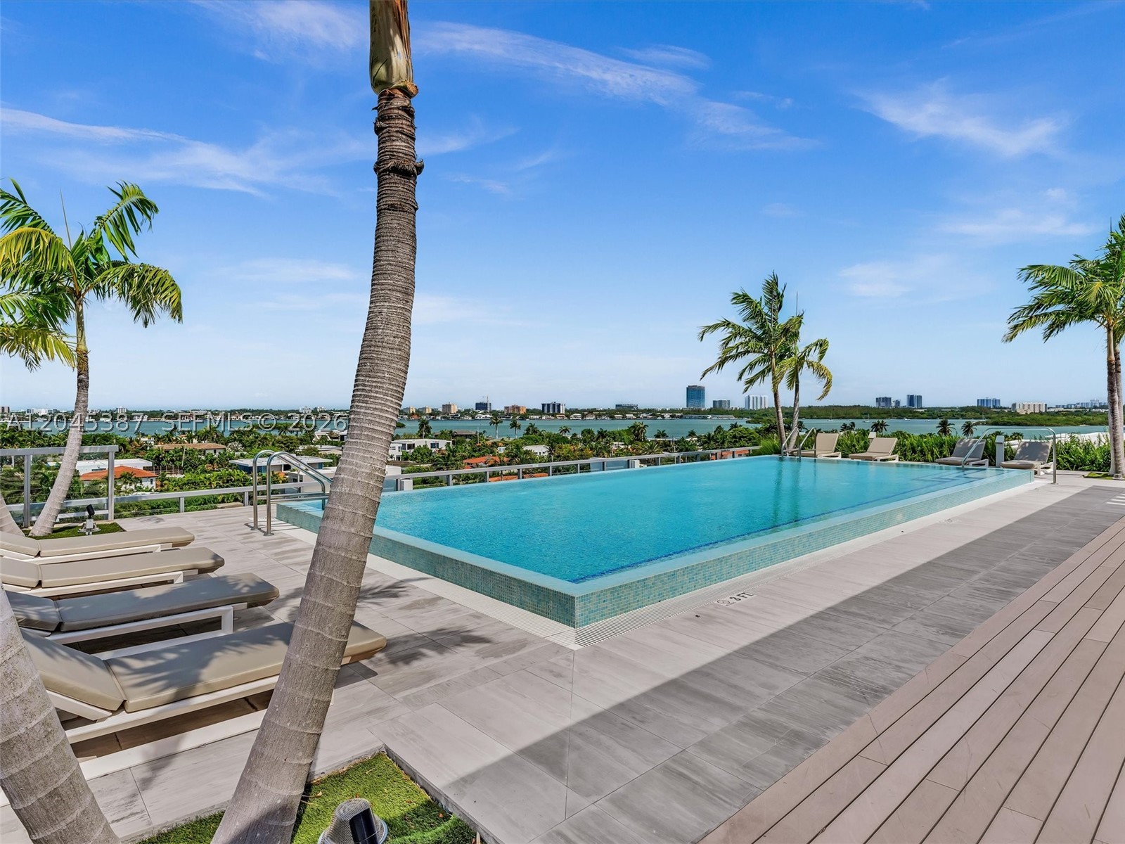 Experience luxury waterfront living at Kai at Bay Harbor in this spacious 2-bedroom + enclosed den, 3-bath residence offering approx. 1,335 SF of modern design and comfort. The enclosed den with full bath functions perfectly as a third bedroom, guest suite, or private office, adding rare flexibility in today’s market.

Floor-to-ceiling impact windows fill the home with natural light, highlighting the open-concept layout ideal for both entertaining and everyday living. The chef-style kitchen features premium appliances, sleek cabinetry, and an oversized island that seamlessly connects to the living and dining areas. Convenient in-unit washer and dryer add everyday ease.

The primary suite offers generous closet space and a spa-inspired bathroom designed for relaxation. The residence includes two assigned parking spaces and access to Kai’s boutique amenities, including a rooftop pool with panoramic bay views, fitness center, marina access, concierge, and elegant common areas.

A rare opportunity for boaters, dock slips are available (subject to availability), adding exceptional value and lifestyle convenience.

Ideally located in Bay Harbor Islands, just minutes from Bal Harbour Shops, beaches, A-rated schools, Surfside, and top dining. Luxury, location, and flexibility combine in one of Miami’s most desirable waterfront communities. Schedule your private showing today.