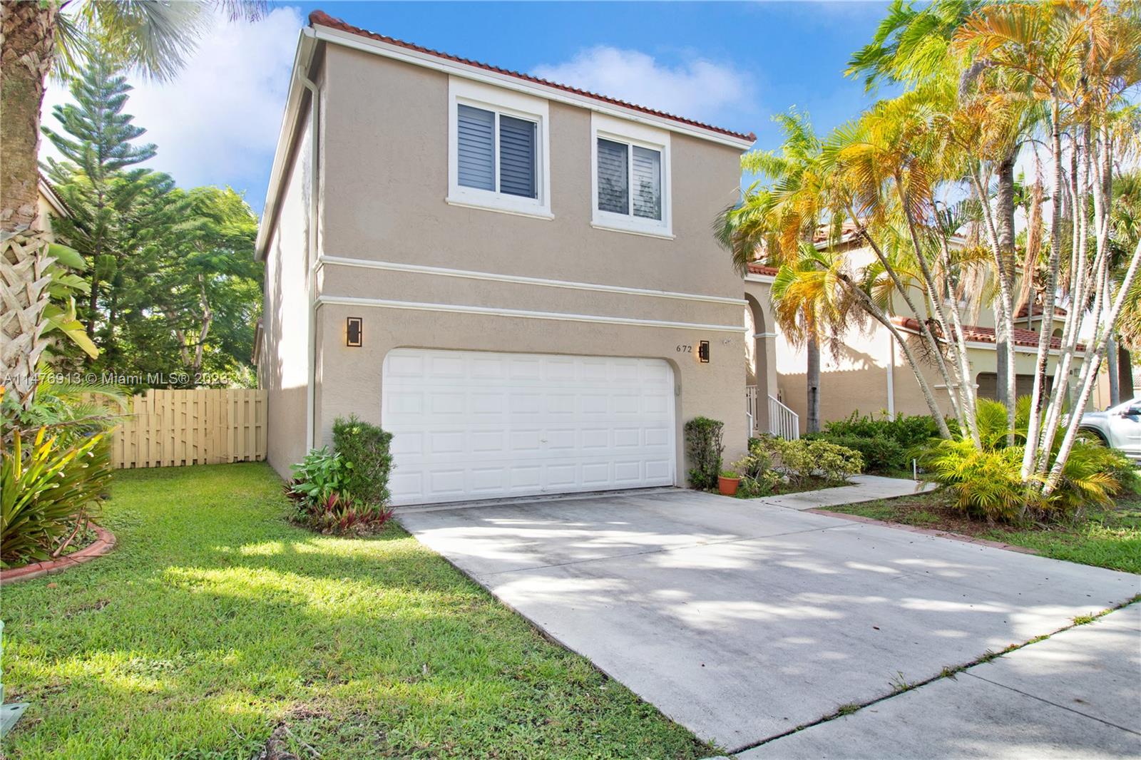 Beautiful house with open floor plan on the 1st floor. Fenced backyard with banana trees and covered Pergola, great for relaxing and outdoor entertainment. New kitchen with Quartz countertops (2020) and stainless steel appliances. New porcelain wood look a like tiles throughout both floors. Carpet on the staircase. New half bath and water heater (2020). New A/C (2022). This property also offer hurricane impact windows and garage door. This gem is near shopping centers, schools, restaurants, International Airpot, beaches, highways to Miami and Ft. Lauderdale. Tenants will enjoy the Towngate amenities which includes a clubhouse, swimming pool, gym and tennis courts.