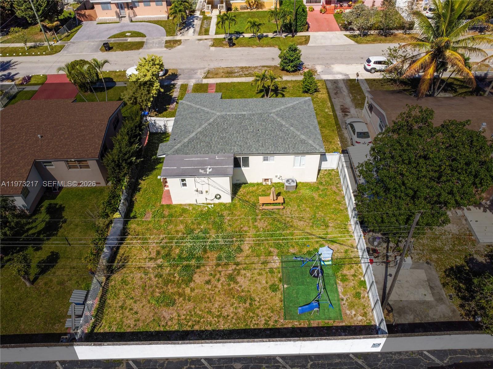 Elegant, 3-bedroom, 2-bathroom residence located in the heart of North Miami Beach. This beautifully home features a warm and inviting kitchen equipped with dual sinks and two dishwashers - offering both style and exceptional functionality for everyday living and entertaining.

Step outside to a private, fenced-in backyard showcasing a lush green lawn and charming swing set — the perfect setting for relaxation, gatherings, or play.

Ideally situated just minutes from I-95, this prime location offers effortless access to the beach, premier shopping destinations, parks, houses of worship, public transportation, and top-rated schools — all within walking distance or a short drive.

A rare opportunity to enjoy comfort, convenience, and refined living in one of North Miami Beach’s most desirable neighborhoods.