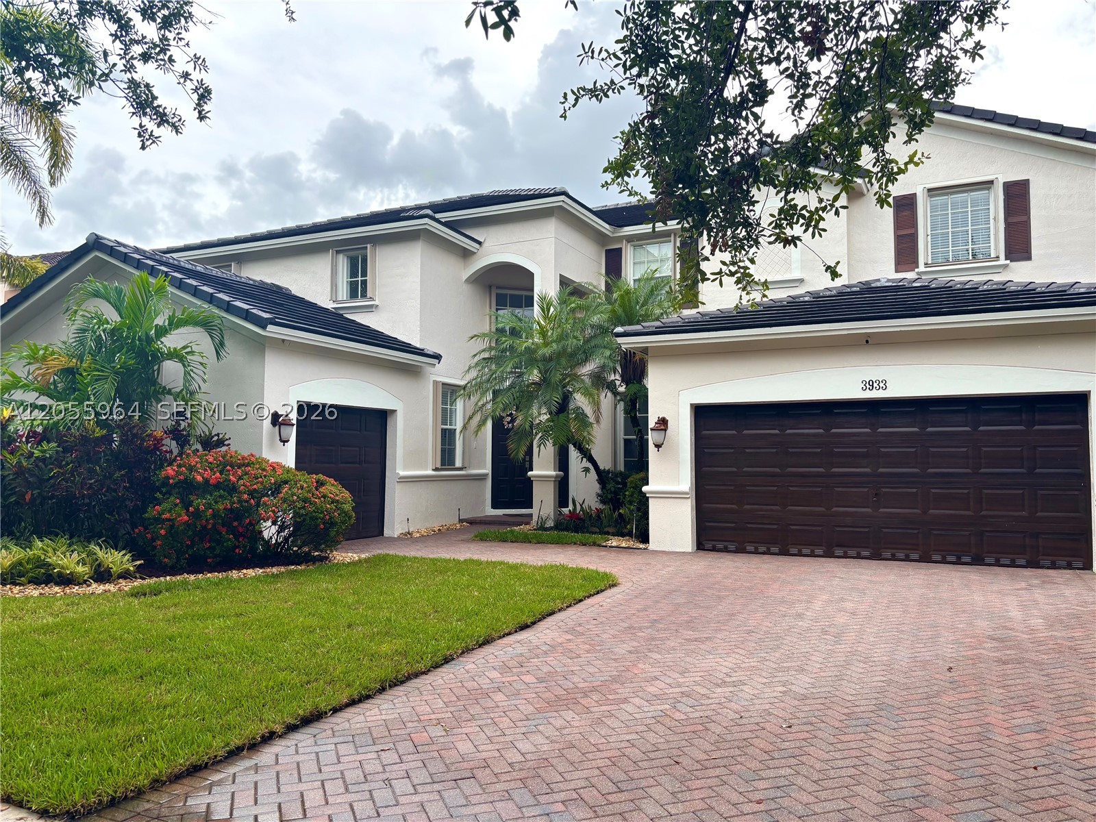 Stunning waterfront residence in one of Weston's most desirable gated communities! This beautifully updated 5-bedroom, 3-bath home offers over 3,000 square feet of bright, open living space designed for today's lifestyle. The showpiece of the home is the spectacular designer kitchen, featuring custom cabinetry, premium finishes, an oversized center island, and an open-concept layout that flows seamlessly into the main living areas perfect for everyday living and entertaining.

Step outside to your own private resort-style oasis where a sparkling saltwater pool with automated controls overlooks tranquil lake views. The expansive covered patio and beautifully landscaped backyard create the perfect setting for outdoor dining, entertaining, or simply relaxing while enjoying South Florida's year-round lifestyle.

Additional upgrades include a NEW ROOF (2023) and updated electrical system, providing both luxury and peace of mind. Located within an A-rated school district and just minutes from Weston Town Center, parks, shopping, dining, and major highways. A truly move-in-ready waterfront home that offers the perfect combination of elegance, comfort, and resort-style living.