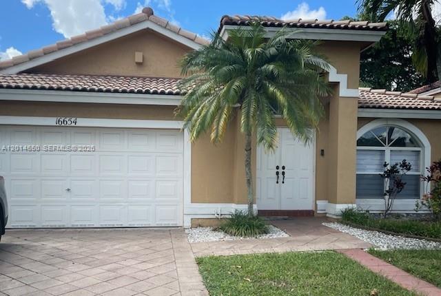Come see this beautiful, turnkey single family, double car garage, paver driveway, one-story home in a great location full of infrastructure around such as parks, shoppes, supermarkets, and dining. As you enter, you will see the high ceilings leading to the living area, dining room, huge kitchen and family room. The sliders will lead to an inviting back yard with a built-in bbq grill and enough space to entertain and even build a future pool. As you return to the interior, retreat toward 4 bedrooms and 2 full baths that have been remodeled and look amazing. The house passes the 4-point wind mitigation due to its accordion shutters throughout, reinforced garage door and reinforced roof truss straps. House is vacant and ready to show, just contact listing agent to schedule your appointment.