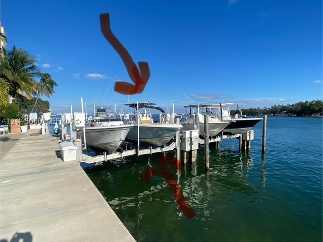 Enjoy South Florida's boat life year round in this tropical escape by owning your own boat slip within a unique boutique and secured marina in a prime location on Biscayne Bay between The Rickenbacker Causeway and newly built high end UNA Residences in Brickell. You don't have to own a condo at Brickell Biscayne to be able to purchase your slip. Monthly maintenance of $265 includes individual electric and water. Your boat lift holds up to 15,000 lbs and maximum length of 26 feet and 8 feet wide. One parking spot available and your own storage box. You own the submerged land beneath your slip. Bring your boat and make the most of the open water!!!!