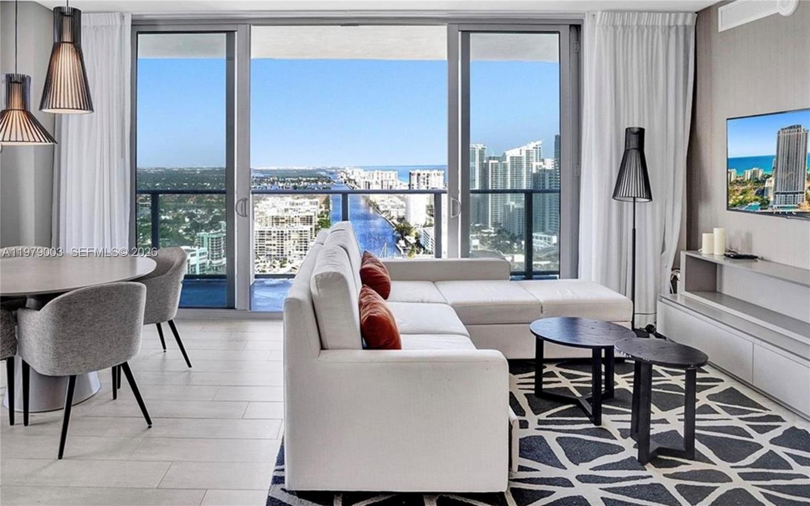 Corner two-bedroom residence at Hyde Beach House offering beautiful views of both the Atlantic Ocean and the Intracoastal Located on the 14th floor, this bright and spacious unit features floor-to-ceiling windows that capture water views from multiple angles and fill the residence with natural light throughout the day
The open kitchen is equipped with modern cabinetry, premium appliances, and quartz countertops, seamlessly connecting with the living & dining areas and extending to a private balcony where you can enjoy sunrise and sunset views over the water

The split floor plan provides privacy between the two bedrooms The primary suite offers direct water views, spacious closet, and an en-suite bathroom The second bedroom is also generously sized and benefits from the corner layout with additional windows

Hyde Beach House is a resort-style condominium located directly across from the beach in Hollywood offering an exceptional lifestyle for both owners and guests Amenities include a rooftop pool with panoramic views, fitness center, tennis court, basketball court, racquetball court, spa facilities, restaurant, 24-hs security, concierge & valet service

The building allows short-term rentals through approved platforms, making it an attractive option for investors while also providing the comfort of a full-service residential experience

Ideal as a vacation residence, investment property, home with water views in one of South Florida’s most dynamic beachfront areas