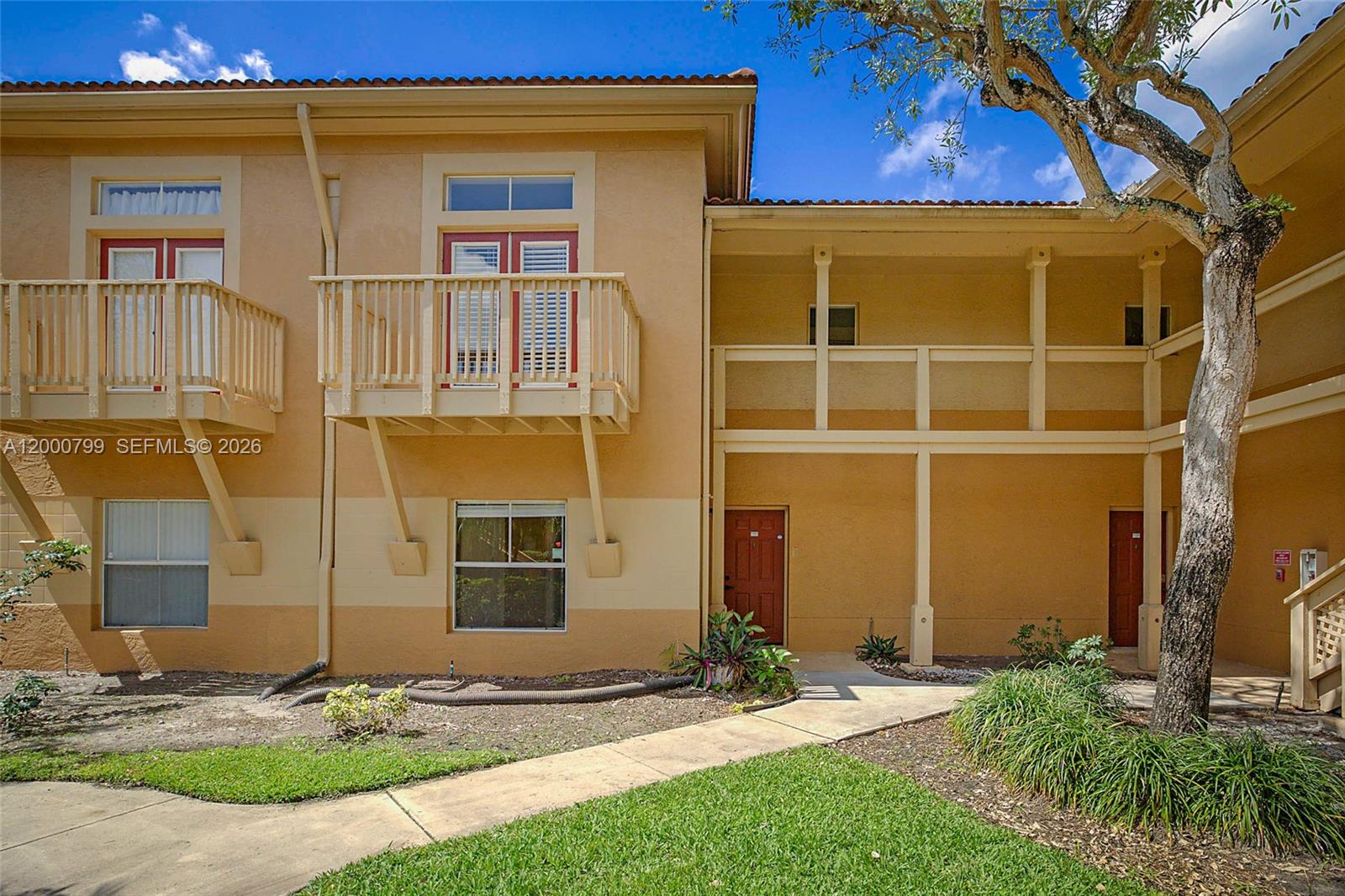 HUGE PRICE IMPROVEMENT!!! Open and Spacious - OVER 1100 Sq Feet Under Air!  Well-Maintained and Hard to Find 2 Story, 2 Bedroom Model with Expansive Windows and High Ceilings that let in the Natural Light for a Relaxed and Open Home. Perfect for Full Time, Seasonal or Investment owners.  Move-In Ready! Large Downstairs Covered Patio AND a Balcony off the upstairs Primary Bedroom.  2 Full Bathrooms, Walk-In Closets, W/D in the Condo.  Gated Resort-Style Community with Fully Equipped Gym, Pool, Spa, Clubhouse, Tennis Courts, Car Wash, Picnic Area, Onsite Management AND is Pet Friendly with No weight limits. (Breed restrictions apply)  Prime Location in West Palm Beach - close to everything. South Florida Living at it's Best! Condo fees include Water and Building Insurance. Immediate Leasing Okay with Restrictions.