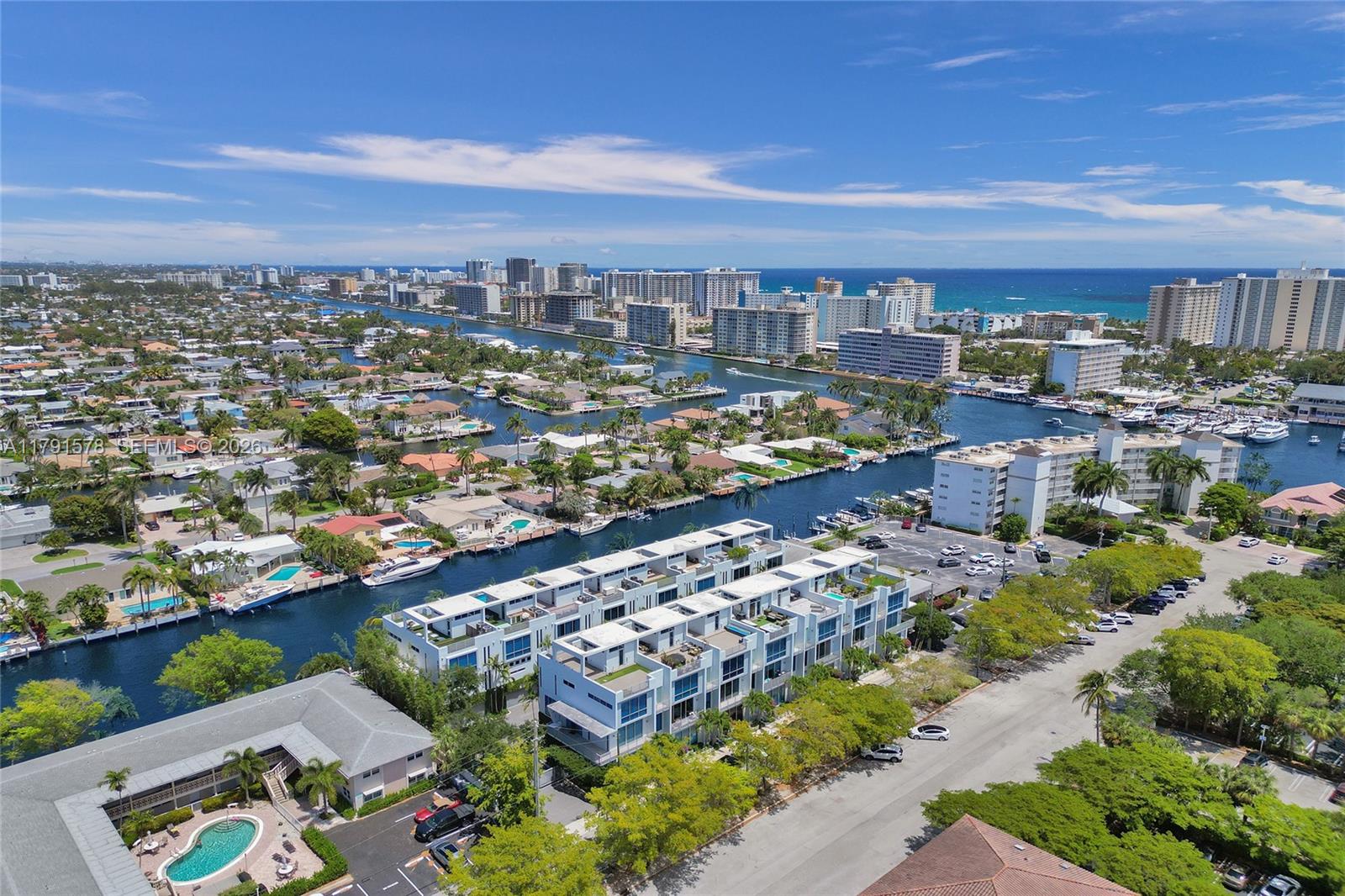 Experience elevated coastal living in this 4-story Pompano Beach townhouse, featuring a private elevator connecting every level, a full backup generator, and a 35’ deeded boat dock just steps away — perfect for boating enthusiasts, while maintaining privacy from the main home.

This nearly 3,000 sq ft residence offers 3 bedrooms, 3.5 bathrooms, a 2-car garage, impact windows, and 10-ft ceilings throughout. Every level is enhanced with a Crestron smart home system, blending modern convenience with refined luxury.

The chef’s kitchen is outfitted with Sub-Zero & Wolf appliances, gas range, warming drawer, wine cooler, and marble countertops. The primary suite features custom closets and elegant finishes, while a private rooftop terrace provides the perfect setting for sunrise coffee or sunset entertaining.

Just a short walk to the beach, fine dining, and boutique shopping — this is coastal luxury at its finest.

For showings and additional details, please see Broker Remarks.