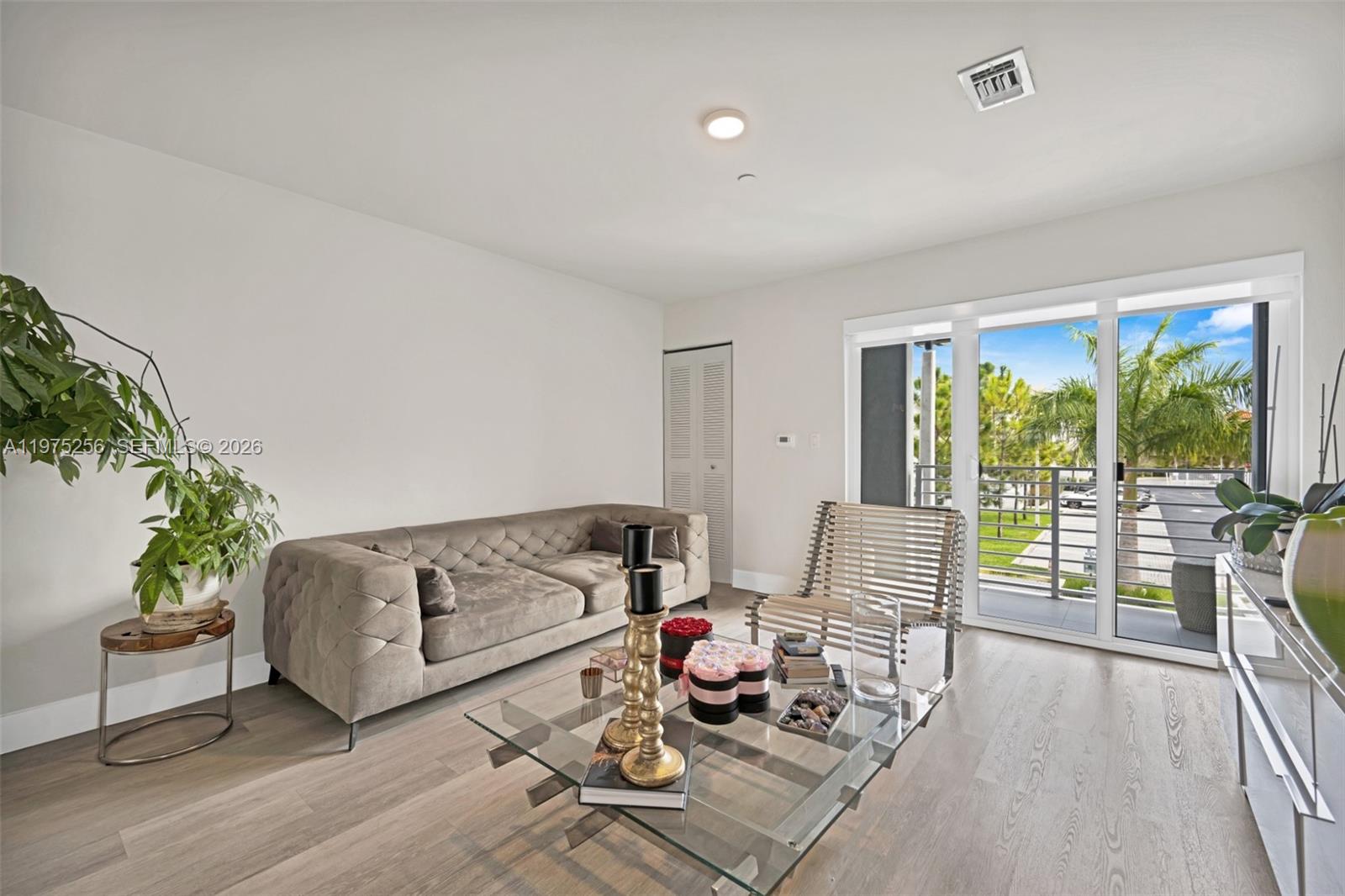 Beautiful split-level contemporary townhouse-style apartment featuring 2 bedrooms, 2 full bathrooms (including a primary en-suite) and 1 half bath, along with a generous den ideal for a home office or additional living space. The open-concept kitchen offers a center island, brand-new stainless steel appliances, and soft-close cabinetry. Separate dining and living areas lead to a private balcony. Additional highlights include in-unit washer and dryer, central air conditioning and heating, and more. Enjoy views overlooking the community pool and BBQ area. Conveniently located near the Aventura Brightline station, Aventura Mall, retail stores, restaurants, and in the path of progress due to major developments in the area. Property is tenant-occupied through January 2027 and comes with 1 assigned parking spot. Showings available by appointment only with 24-hour notice.