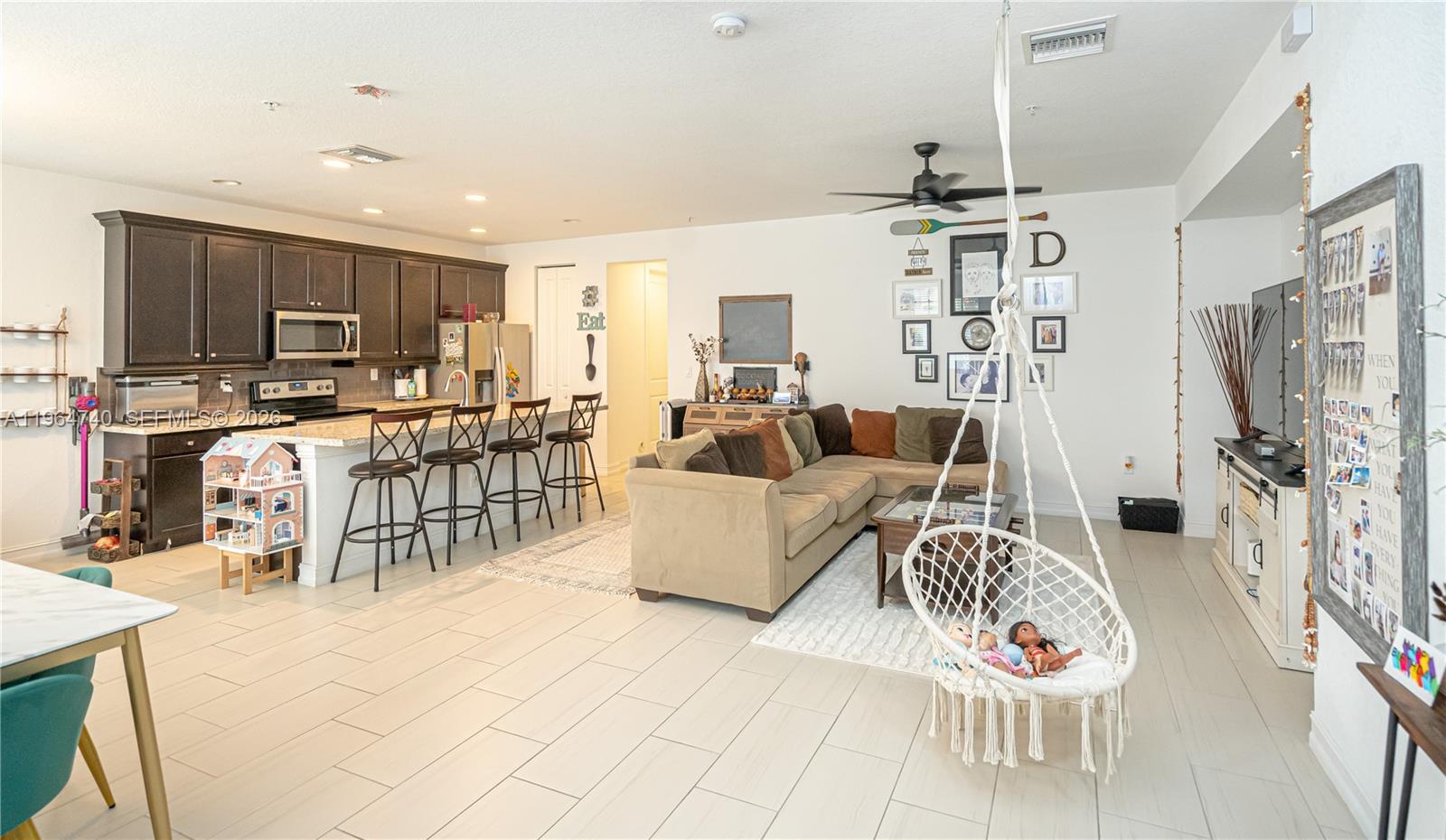 Stunning Ventura model townhome in exclusive gated Raintree! Bright open layout, elegant kitchen w/ample storage and large island. All3 beds upstairs, each w/private bath. Primary suite boasts 2 walk -in-closets and balcony.Laundry upstairs.3rd garage space for storage or small car.Resort-style clubhouse-luxury living at its best!Located in the heart of Pembroke Pines, near top schools, shops and dining. This stunning property is back on the market after attracting multiple strong offers! The owner is now highly motivated, ready to sell, and prepared for a smooth and timely closing. Don’t miss this exceptional opportunity!