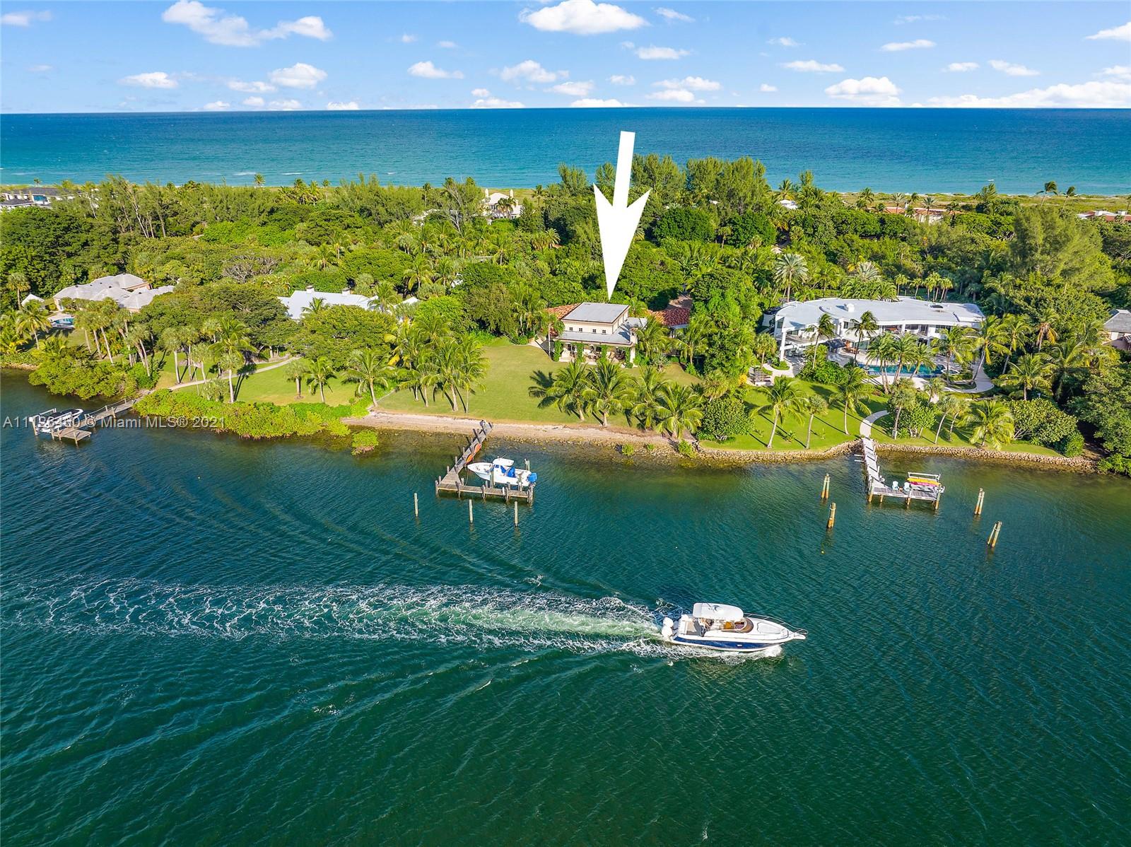 Spectacular location, this property sits on approximately 1.41 acres with 179 feet of waterfront. It includes a deep-water dock that can accommodate a 70-foot yacht and a lift for an additional 30-foot boat, a rarity on Jupiter Island. With deeded beach access just across the street.
Access the pristine beaches of Jupiter Island through a deeded beach access rite of way, just steps from your home.