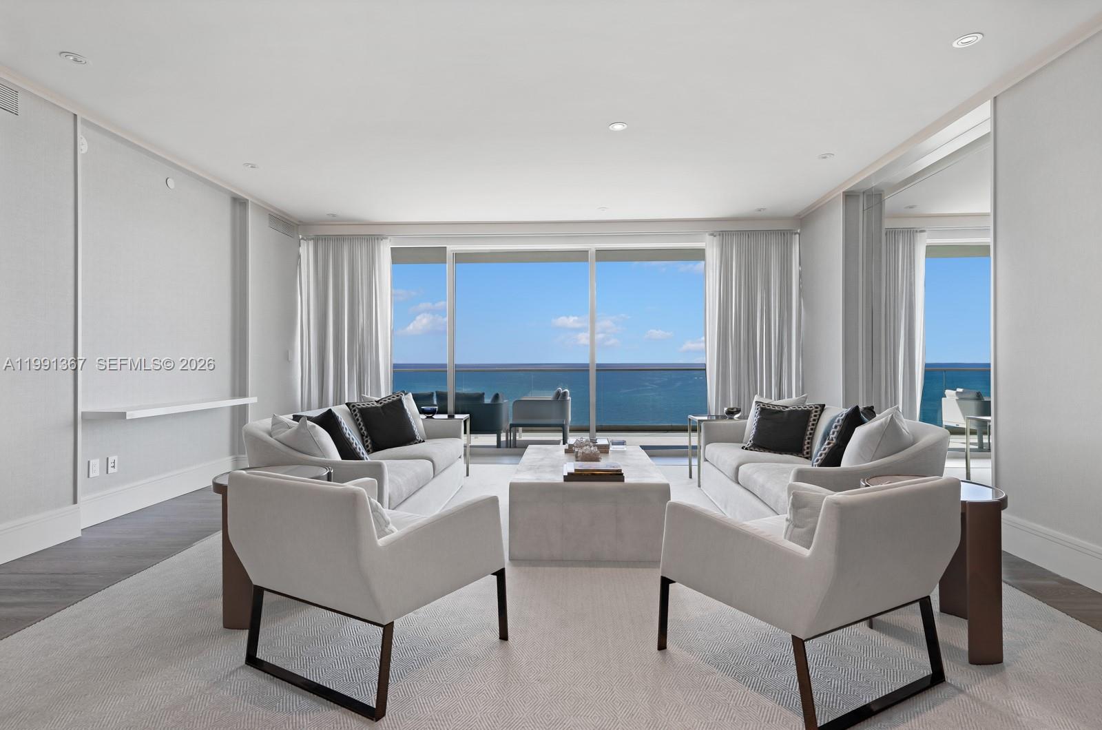 Ultimate sanctuary in the sky at Bal Harbour's most coveted address. Turnkey residence showcases breathtaking ocean, bay & city views with unobstructed East & West exposures throughout the 3 BD plus staff room, 4.5 BA residence. Crafted by Gluckstein Design, each detail of the 3,592 SF, flow-through living space is curated with no expense spared. Private elevator entry opens to light-filled living area with floor to ceiling sliding glass. A bespoke kitchen features Gaggenau appliances, eat-in island & dining room. Bright private office, spa-like primary bath, family room, plus expansive oceanfront & bayfront terraces. Oceana offers privacy & resort amenities including beach/pool service, restaurants, tennis courts, spa, fitness center. Steps from Bal Harbour Shops.