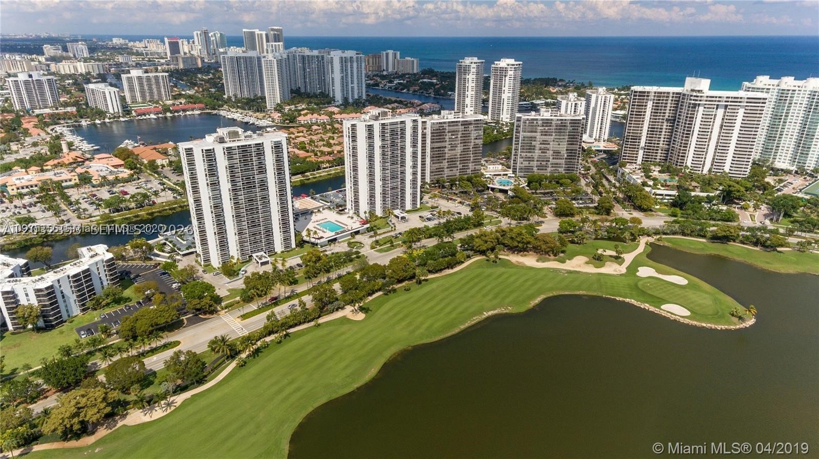 Experience the epitome of luxury living in this expansive corner unit, one of the largest floor plans available within the prestigious development. Ideally situated on the renowned Country Club Drive, this residence offers an unparalleled lifestyle. Enjoy breathtaking, panoramic views overlooking the lush greenery of the Turnberry PGA golf course and the world-class resort. The property includes the added convenience of dedicated covered parking, ensuring comfort and ease. This is a rare opportunity to own a premier condo in a highly sought-after location.