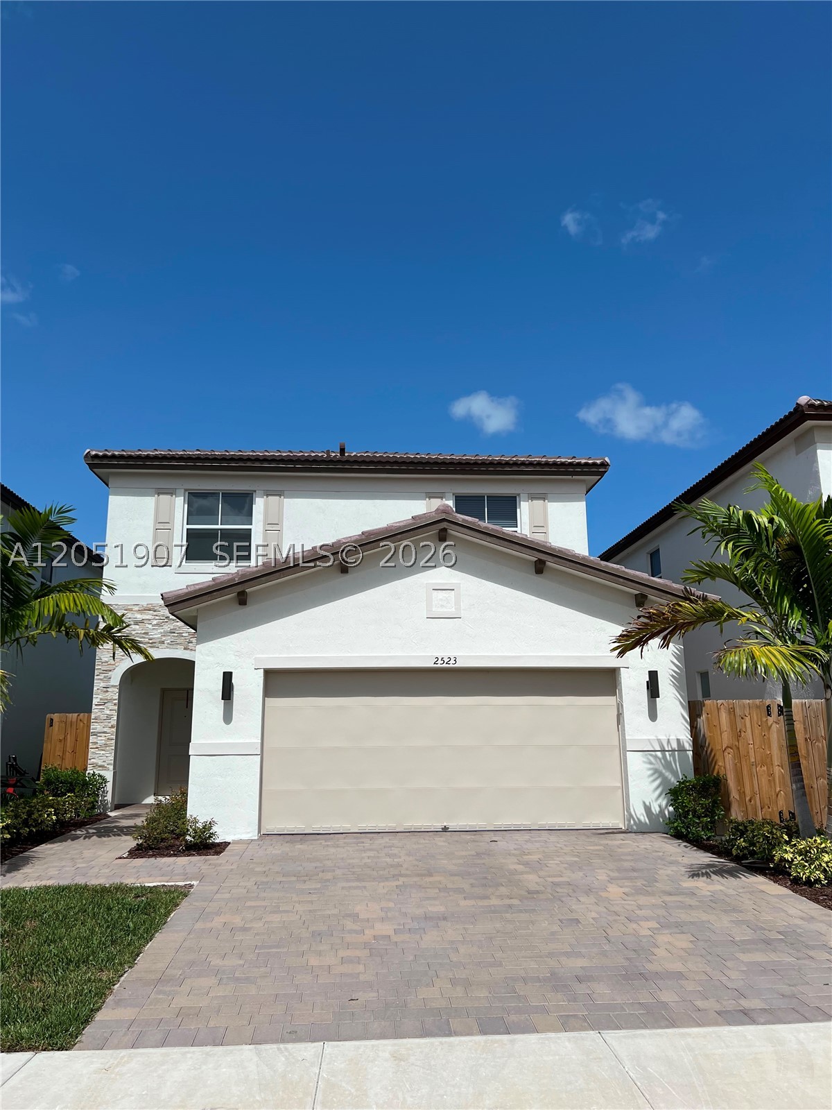 Beautiful two-story single-family home built in 2025 and located in the desirable Altamira community within the Keys Gate area. This spacious residence features 3 bedrooms, 2.5 bathrooms, a versatile first-floor den, and a 2-car garage. The modern open-concept design seamlessly connects the kitchen to the spacious Great Room and provides convenient access to the backyard. Upstairs, the primary suite features a walk-in closet and private en-suite bathroom, along with two additional bedrooms. Enjoy the lifestyle of a golf course community with a new clubhouse planned to open in 2026, offering amenities for residents. Ideally located near Keys Gate Charter School, Publix, Homestead Commerce Park, the Amazon fulfillment center, and Homestead-Miami Speedway, approximately 7.4 miles from Homestead Bayfront Park and 7.5 miles from Homestead Air Reserve Base. Conveniently located near shopping, dining, new commercial and recreational developments, Florida’s Turnpike, and major roadways. An excellent opportunity to own a nearly new home in one of Homestead’s fastest-growing areas. Schedule your private showing today! Enjoy the lifestyle of a golf course community with a new clubhouse planned to open in 2026, offering amenities for residents. HOA fee includes internet service and lawn maintenance.