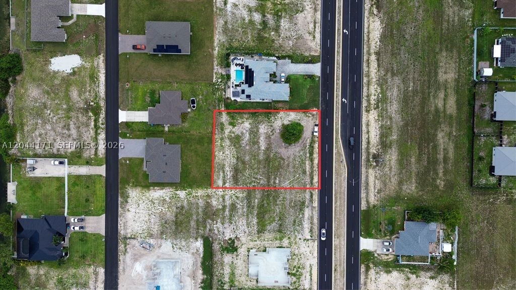 Build your dream home on this 15,000+ SF residential lot zoned R1 in Cape Coral, located at 504 Diplomat Pkwy. Water, sewer, and irrigation assessments are all fully paid, saving the buyer significant upfront costs and making this lot truly build ready. Seller financing available, making this an easy entry point for buyers or investors looking to build now or hold for future development. Don't miss this rare combination of paid assessments, extra space, and flexible financing in a growing Cape Coral corridor.