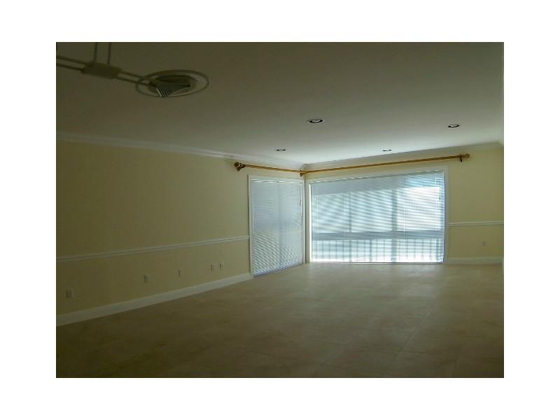 Corner top floor apartment with porcelain floors and totally remodeled, washer and dryer inside the unit.  Walk to the beach with private entrance. Rec. room, Sauna and 2 parking spaces.