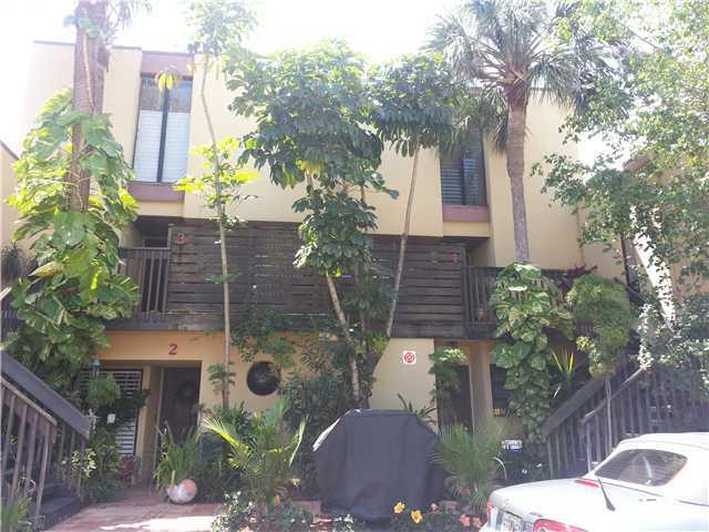 Updated TOWNHOME EAST SIDE ACROSS FROM BEACH ON 14TH Street! Immaculate, 2-Story Townhome. 2 private Master Suites upstairs, with full bathrooms/walk in closets. Screened wood deck upstairs and back screened patio overlooking garden/pool. Spiral staircase  to 2nd floor, stain steel appliances. Eat-in kitchen,large family room and Laundry Rm. A rare find with only 7 units in complex.  Restaurants, Tiki bar, and Community boat dock across the street with just a short walk to the Pompano Pier! Small dogs ok.