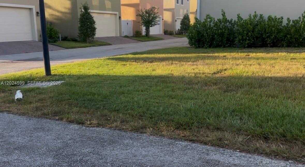 Land opportunity, homes in the neighborhood have sold for upwards of $360K. East Lake Village community with residential Townhomes