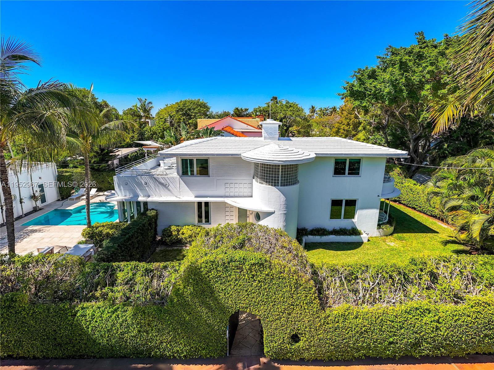 Rarely available Art-deco home designed by famous architect, Henry Hohauser, winner of the Miami Designer Preservation League "Barbara Capitman Award."  Gated property situated on an oversized corner lot, beautifully landscaped with privacy hedges, featuring detached guesthouse and incredible backyard with swimming pool, outdoor dining and lounge areas. Inside, a brand-new designer kitchen with Wolf range/oven, Sub Zero Refrigerator, 2 dishwashers and wine cooler, 2 brand new AC units, a new power generator, and stunning terrazzo floors throughout. One of a kind property with prime central location on quiet street, minutes to the best of South Beach, golfing, beaches, parks, dining, entertainment, and more.