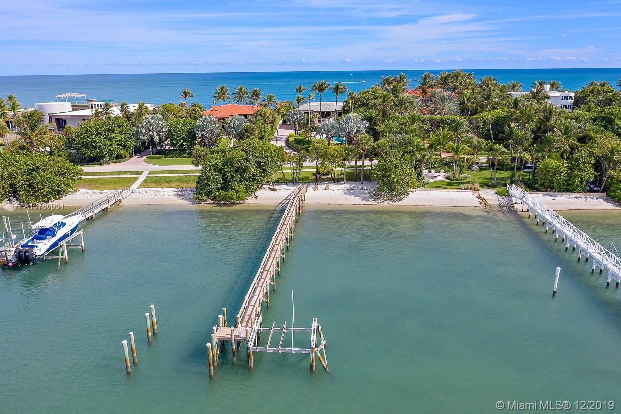 Surrounded by blue water and beaches on both sides, this OCEAN TO INTRACOASTAL property located on the south end of Jupiter Island is the best of both worlds! Renovated in 2012, the oceanfront South Seas Island contemporary sits directly on the sand and includes prime Intracoastal dockage for boats, jet skis, kayaks and paddle boards and provides unfettered access to the Jupiter Inlet just minutes away. A tropical paradise for boater's, fishermen and snorkeler's with breathtaking sunrise and sunset views of both the Ocean and Intracoastal. Room to expand up or out with existing space for a future elevator. Convenient and quick exit off the Island to restaurants, shops, schools and the airport.