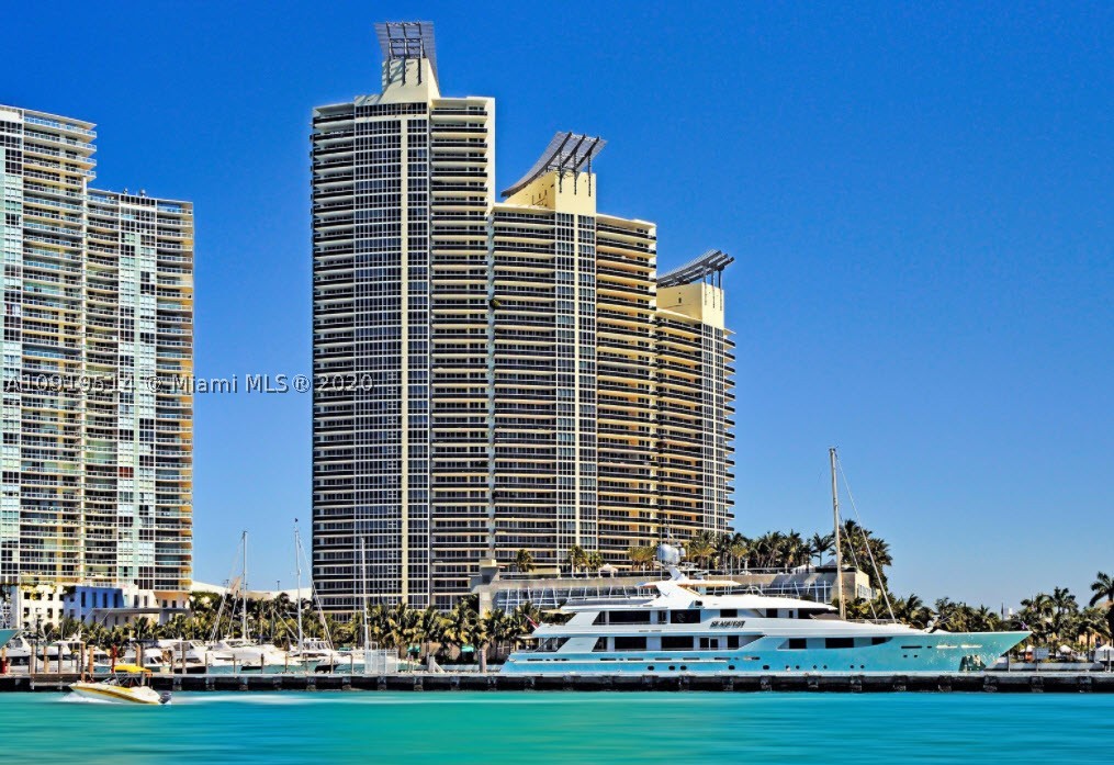 GORGEOUS WRAP-AROUND UNIT OFFERING STUNNING 270 DEGREE VIEWS OF THE OCEAN, MIAMI BEACH, GOVERNMENT CUT, FISHER ISLAND, AND DOWNTOWN MIAMI. AMAZING 4 BEDROOM, 4.5 BATHROOM PLUS DEN UNIT WITH THREE TERRACES AND PRIVATE ELEVATOR. THIS SPECTACULAR CONDOMINIUM OFFERS STATE OF THE ART SPA, POOL, TENNIS COURT, CONCIERGE, AND VALET.