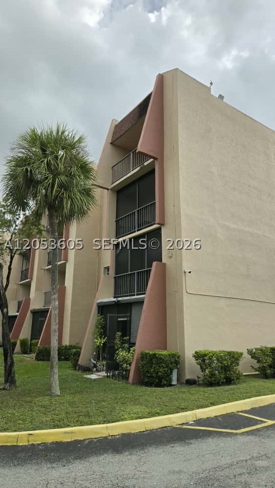 Bright and spacious, this 2-bedroom, 2-bathroom corner penthouse unit offers comfortable modern living with tile flooring throughout, remodeled bathrooms, an updated kitchen, and a washer and dryer for added convenience. Accordion shutters provide extra protection, while the large open balcony invites relaxation and outdoor enjoyment. The freshly painted interior complements a building with a newly installed roof, enhancing long-term value. Residents enjoy a wide range of community amenities, including a pool, tennis courts, children’s play area, and exercise room, all with easy access to major highways for seamless commuting. All information is intended to be accurate but is not guaranteed; agents are responsible for verifying details.