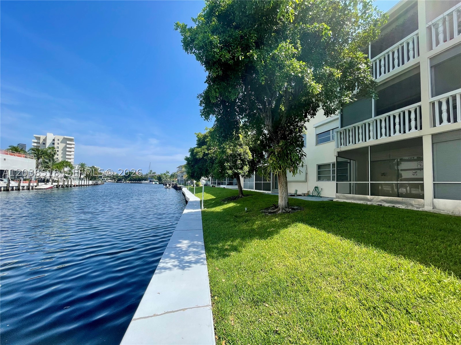 Move in ready condo Located in the tranquil Paradise Isle community of Hallandale Beach, this two-bedroom, two-bath condo offers wood floors and a partially furnished layout (furniture can be removed). Enjoy a spacious screened in balcony overlooking a waterview. Just a short walk to shops, restaurants, Publix, and a few miles from the beach and Aventura Mall. The community also boasts a sparkling pool, making every day feel like a vacation.