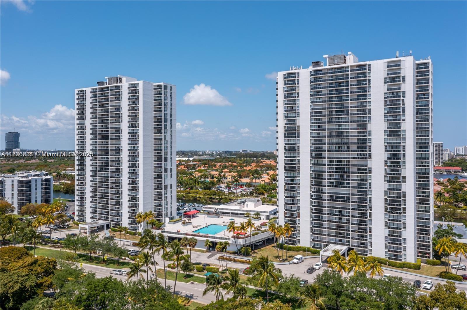 Welcome to this beautifully appointed 2-bedroom, 2-bath residence on prestigious North Country Club Drive in the heart of Aventura. This 996 sq. ft. home with an open balcony, features a desirable split bedroom floor plan with a bright and open layout. Enjoy serene south-facing views of the lush Turnberry Golf Course right from your windows. The remodeled kitchen is equipped with sleek stainless steel appliances, complemented by a newer AC unit and hurricane shutters for peace of mind. Offered furnished or unfurnished and sold as-is, this home provides comfort, convenience, and value. Nestled in a sought-after community close to Aventura Mall, fine dining, marinas, houses of worship, entertainment, and pristine beaches, this is the perfect opportunity to enjoy the Aventura lifestyle.