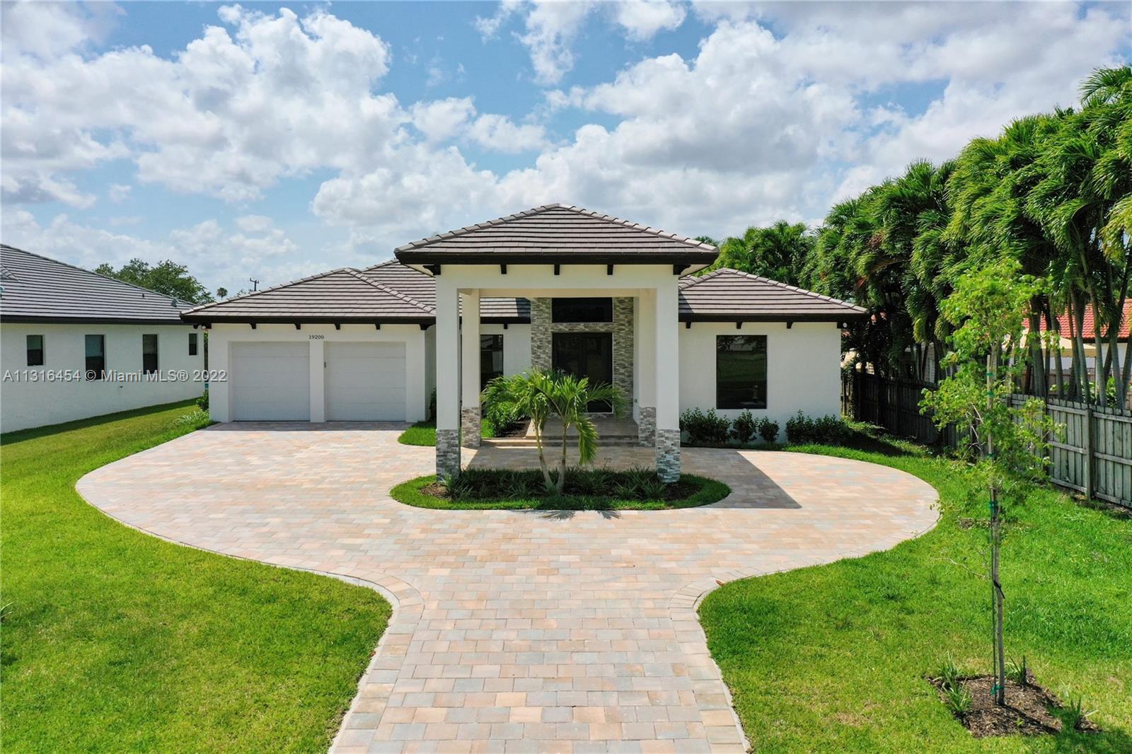 NEW CONSTRUCTION PROPERTY.  White shaker cabinets, porcelain floors throughout house all rooms.  Quartz countertops, impact windows and doors, 10 foot ceilings, tray ceilings in formal dining room and master bedroom.  Pool and jacuzzi, pavers, salt system.  4 bedrooms, 3 baths, 2 car garage and port cochere, 14,000 square foot lot, and impact windows.  Luxurious soaking tub, spa like bathroom with rain shower.