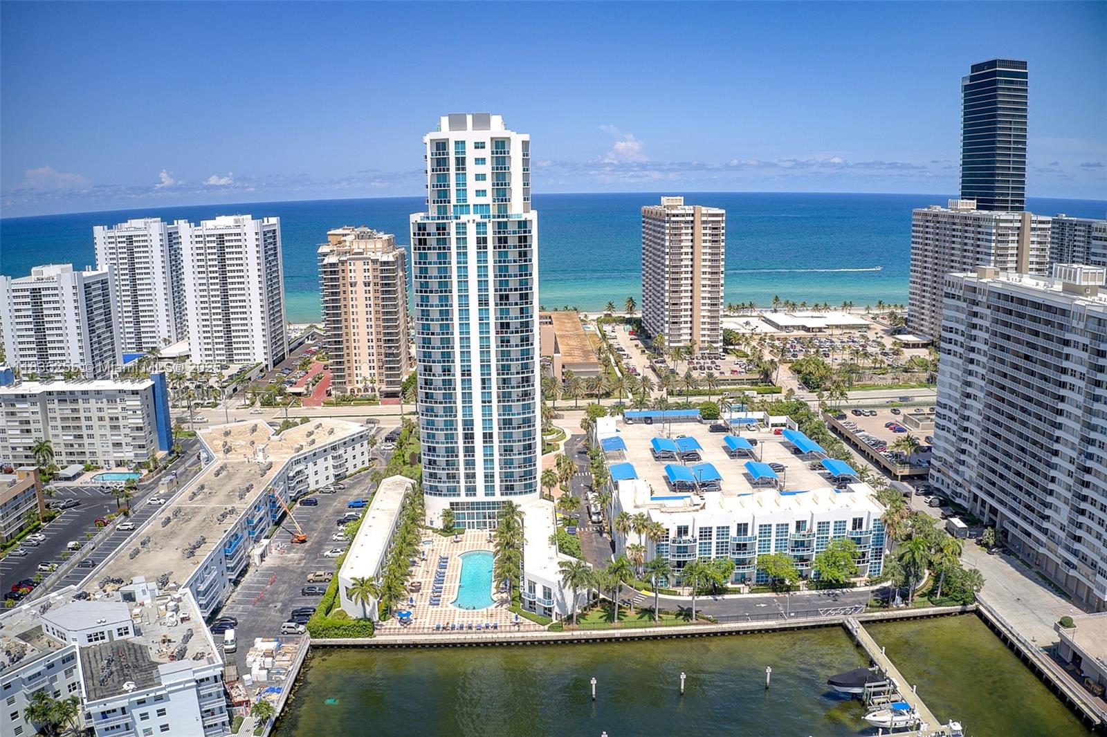 Spectacular 3 bedroom, 3 bath corner unit with beautiful ocean. city and Intracoastal views. Located directly across from the beach, this building stands tall on the Intracoastal Canal, offering obstructed waterfront vistas. This apartment has a open, spacious floor plan. Pets friendly, Wood, and tile floors, floor-to-ceiling windows, Brand new A/C. 2 balconies, 2 assigned parking spots. Amenities include a pool, spa, game room, gym, 24/7 security and valet. Tenant in place through August 31st, 2024 seeking to extend the lease. Seize the unique opportunity to buy this amazing waterfront property! Please call/text listing agents or use Showtime.