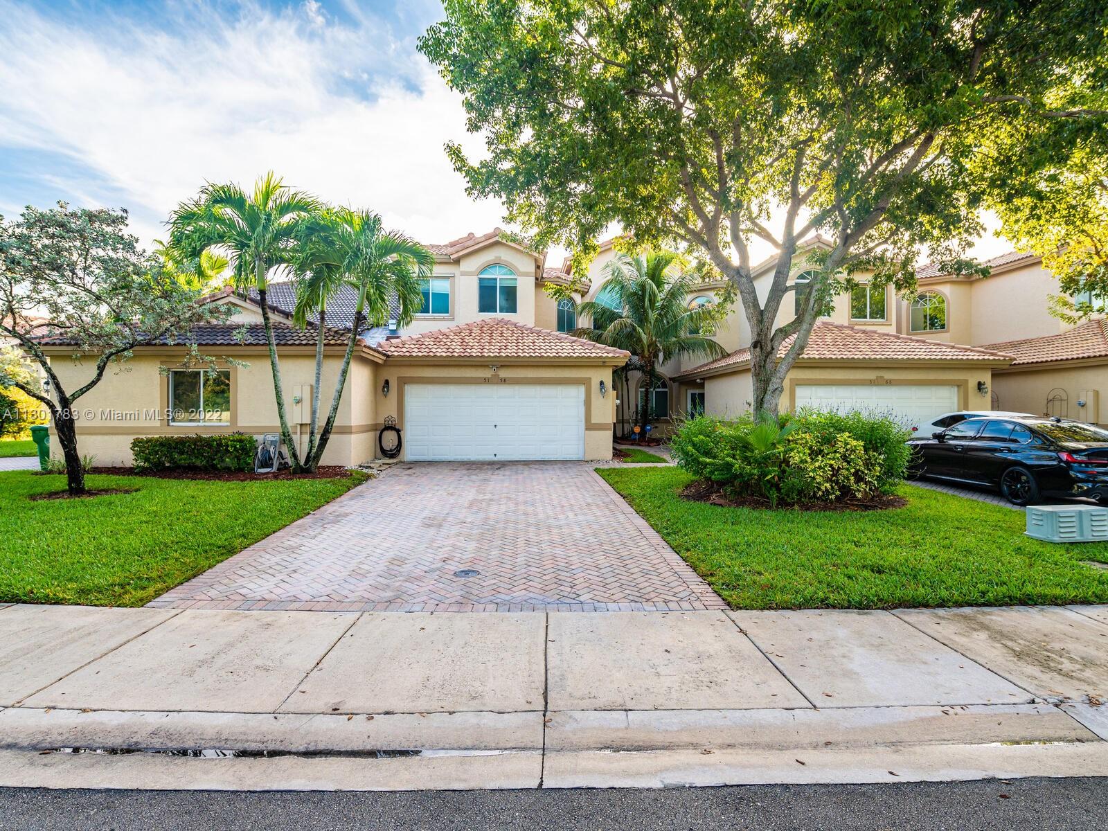 SPECTACULAR MADISON LAKES LAKEFRONT TOWNHOME COMMUNITY IN THE SOUGHT-AFTER AREA OF DAVIE!  THIS SPACIOUS LAYOUT FEATURES~ 3 BED 3.5 BATH + LOFT & DEN + 2 CAR GARGAE WITH 2,400++ SQUARE FEET, NEW 2022 ROOF & WATER HEATER. OPEN CONCEPT KITCHEN, SS APPLIANCES A/C AND 1ST FLOOR VINYL WOOD FLOORING ALL UPDATED/INSTALLED IN 2016. MASTER BEDROOM & GREAT ROOM OVERLOOKING A BEAUTIFUL LAKE ON 1ST LEVEL, OTHER BEDROOMS WITH OPEN LOFT & DEN ON 2ND LEVEL. IMPACT WINDOWS ON MOST WINDOWS & FRONT DOOR, ALL OTHER WITH HURRICANE PROTECTION. A++ SCHOOL ZONE, EXCELLENT LOCATION WITHIN CLOSE PROXIMITY TO SHOPPING, DINING, HIGHWAYS, AND ENTERTAINMENT.. LOW HOA~A MUST SEE!