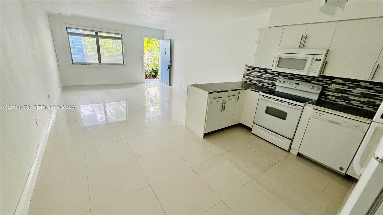 Welcome to the Golden Key Condominium in the heart of Bay Harbor Islands. A rare chance to get a great deal and completely renovate this 1 bed 1 bath w/ open floor plan. Approximately 65 additional square feet from enclosed balcony with windows and air conditioning, not included in the 810 sf. On site laundry , Pool, 1 assigned parking space, 1 large storage unit, can lease right away yearly for 1 year leases, max 2 people per unit, no pets. Close to the Prestigious Bal Harbor Shops, cafes & restaurants on Kane Concourse, Easy access to A1A and beach. A+ K-8 school located within walking distance; rated one of the safest cities in Florida year after year. 40 year
certification in process, no special assessments being discussed or in place. All ages welcome. 2025 Budget has 10% + reserves.