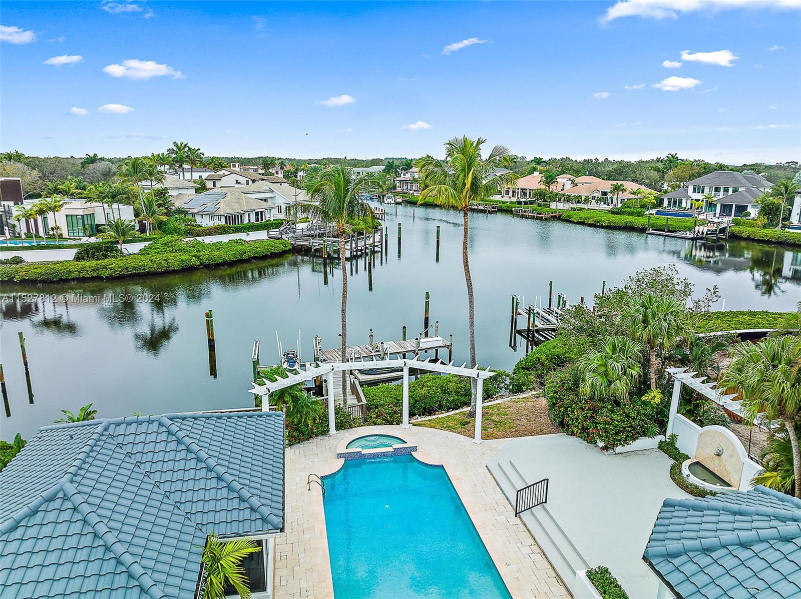 Boaters Paradise - with over 100' of prime water frontage this home is perfect for those who like water crafts. Located on a quiet cul-de-sac in prestigious Admirals Cove this property is a dream opportunity. The interior of the home has been upgraded, large guest rooms, stunning primary bedroom and bath and 3.5 car garage. No better sunsets than from this property that has water views from 3 different directions. This property will not last!!