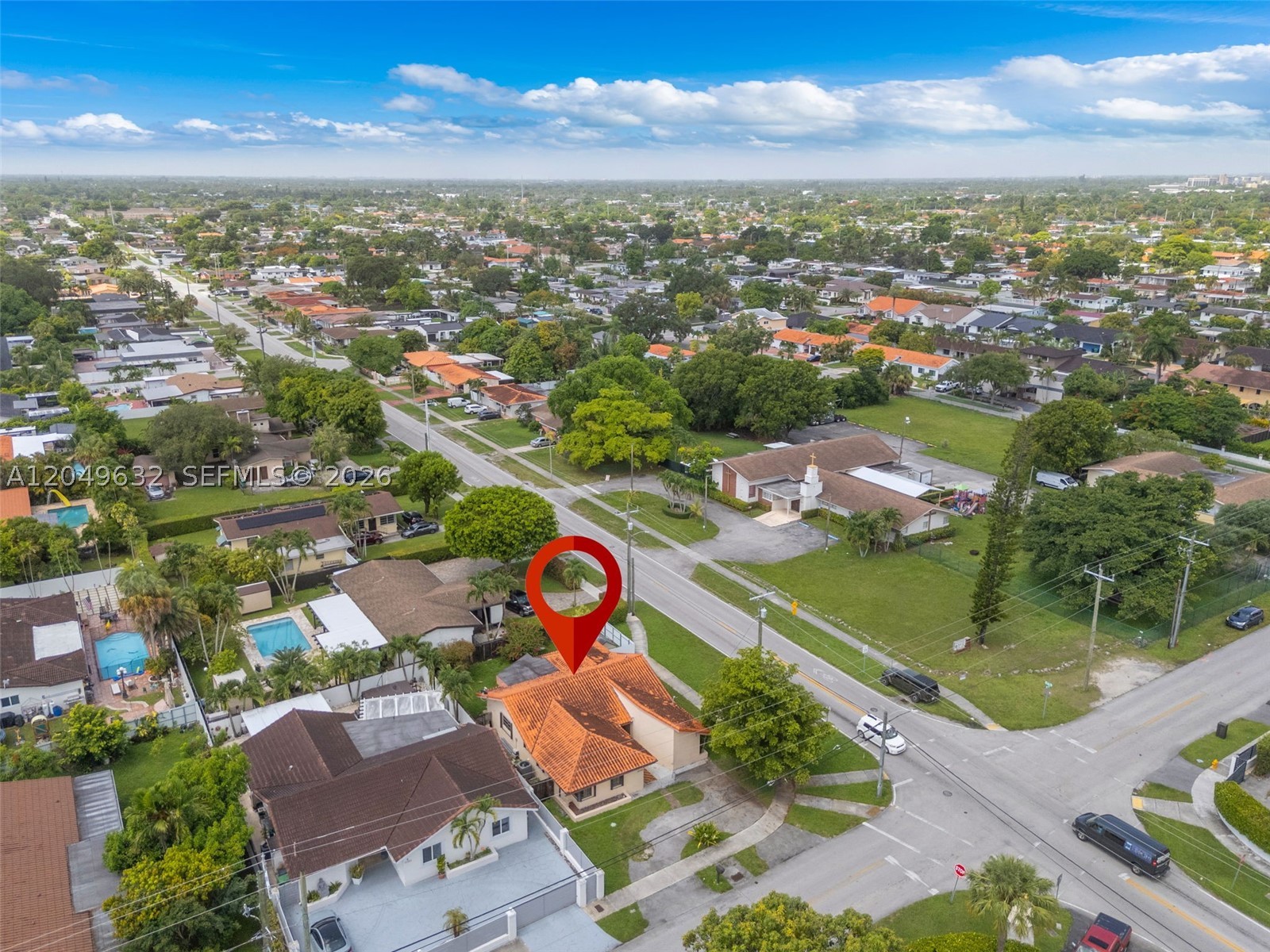 Exceptional Corner 4/3 Built in 1985 with Large Closets & Vaulted Ceilings. Very Bright Home. Formal Family, Dining & Living Rooms. Covered Terrace. Tiled Throughout. Upgraded AC Unit. 2006 Barrel Tile Roof. Laundry Room. Accordion Shutters & More. Show Assist for all Showings.