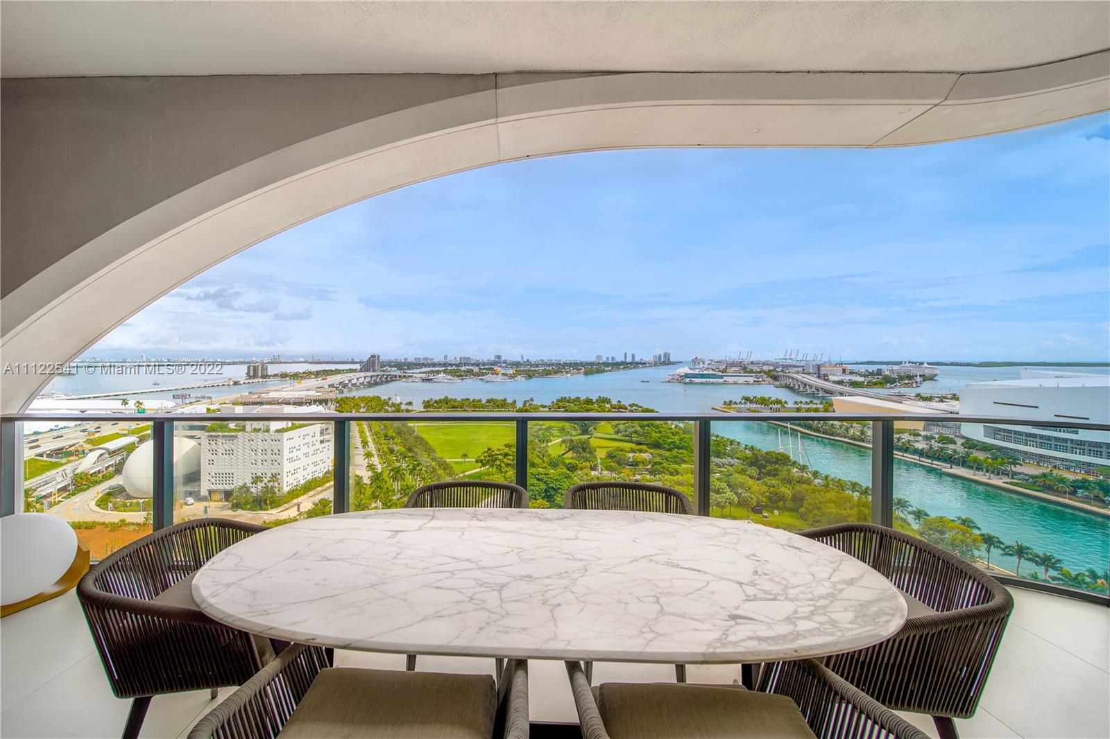 Price Improvement One Thousand Museum Residence designed by legendary architect & visionary Zaha Hadid. Miamis most prestigious Residential Condo.Desirable 01 line/ half floor residence /dramatic views from this flow through unit, from sunrise to sunset, bay, city, ocean and infinite south Florida blue skies.This residence features 4 bedrooms 5.5 bath/maids quarters.Eastern exposure from living room & open kitchen. Kitchen -Polioform-Gaggenau & Subzero appliances.5 Star amenities spa. Unit features bespoke modern LED chandelier in living room& Luke Lamp Co.’s suspended rope pendant.  Living room features Custom wenge wood slat feature wall/framed TV; custom black quartz/ black marble bar w/back bar shelving at wall behind bar.Indoor/outdoor pools/lobby/sky lounge/private Hellapad,BeachClub