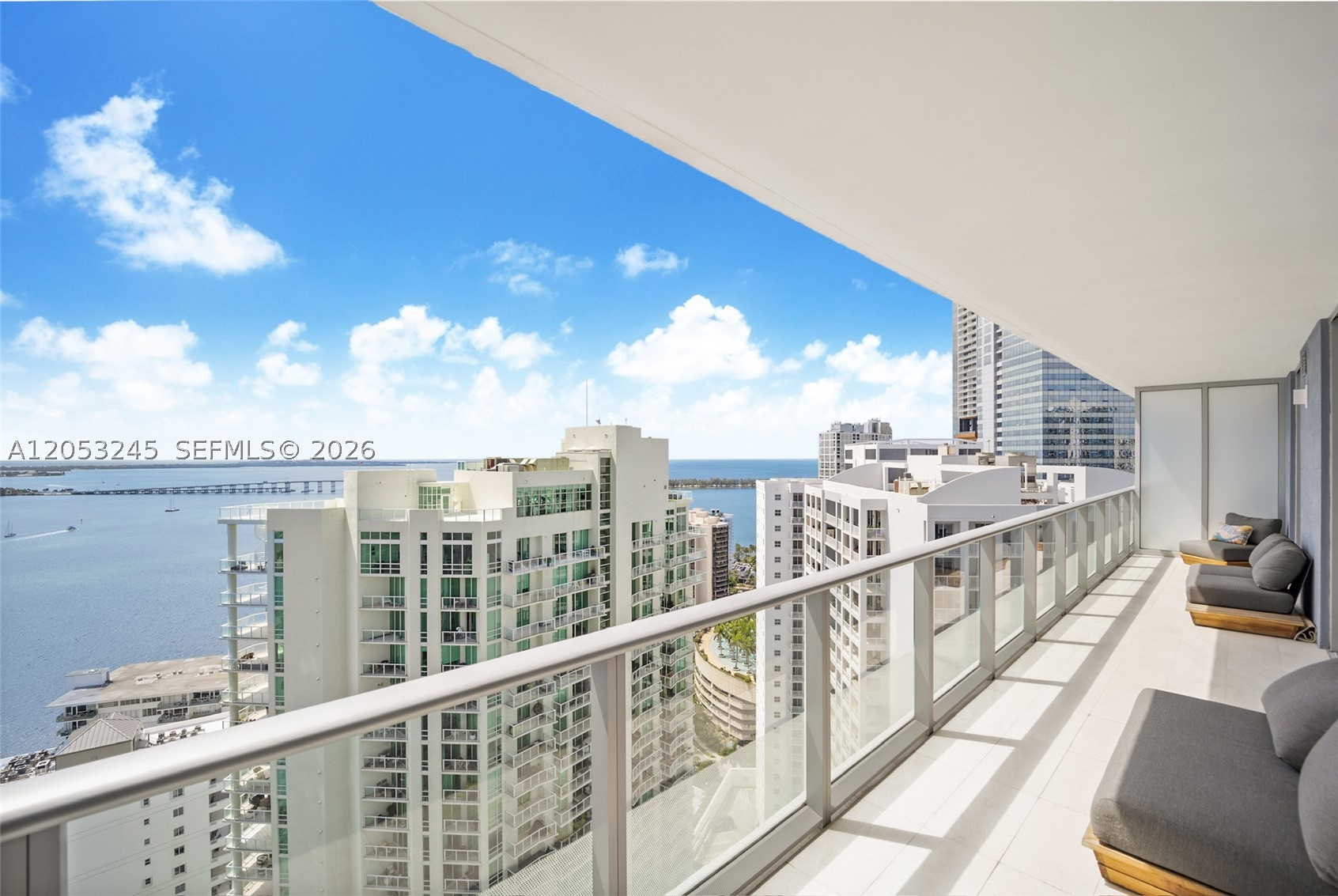 Short-Term Rental Available | Available now – January 1st. Flexible lease terms- minimum one month! Experience luxury waterfront living in this beautifully furnished 2-bedroom + den, 2-bath residence with direct bay views and a spacious balcony. Enjoy a sleek open-concept kitchen with Italian cabinetry and stainless steel appliances, in-unit washer/dryer, and generous closet space. Located in a full-service building offering 24-hour security and premium amenities, including a rooftop pool, lap pool, fitness center, sauna, steam room, valet, and more. This exceptional home combines modern comfort with resort-style living—perfect for those seeking both convenience and elegance.